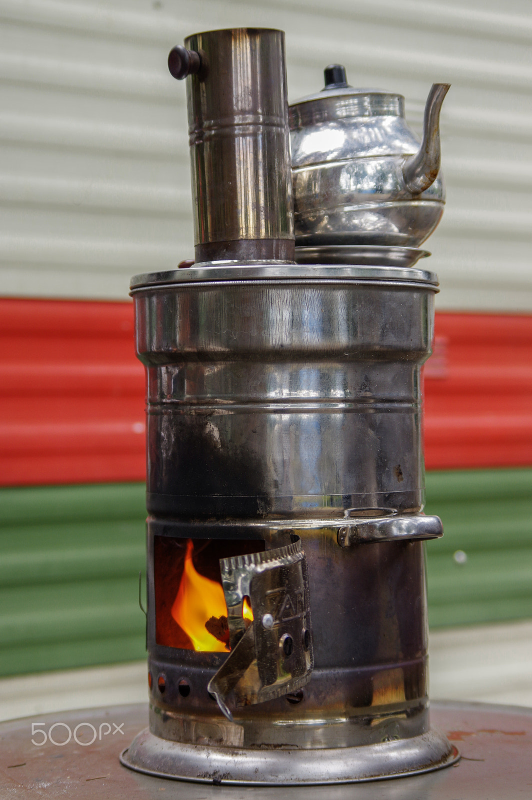 smc Pentax-DA L 50-200mm F4-5.6 ED WR sample photo. Ancient russian samovar with open fire. a device for making tea. photography