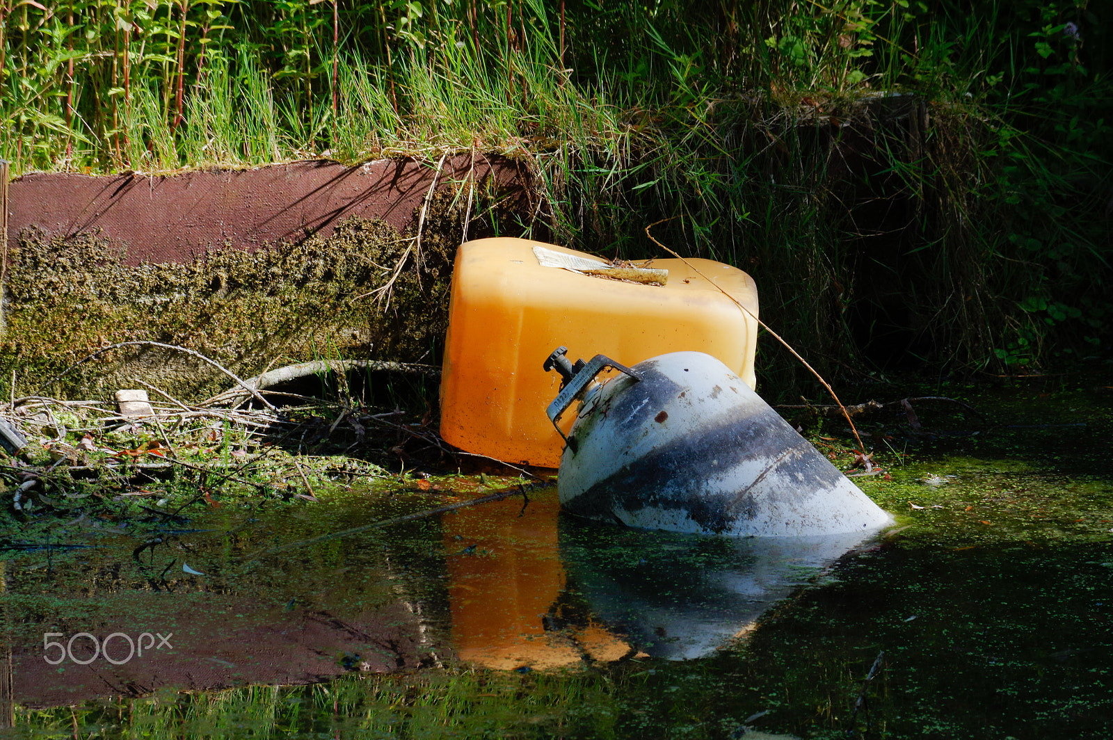 smc Pentax-DA L 50-200mm F4-5.6 ED WR sample photo. Pollution trash in the bottom lake environmental problem photography