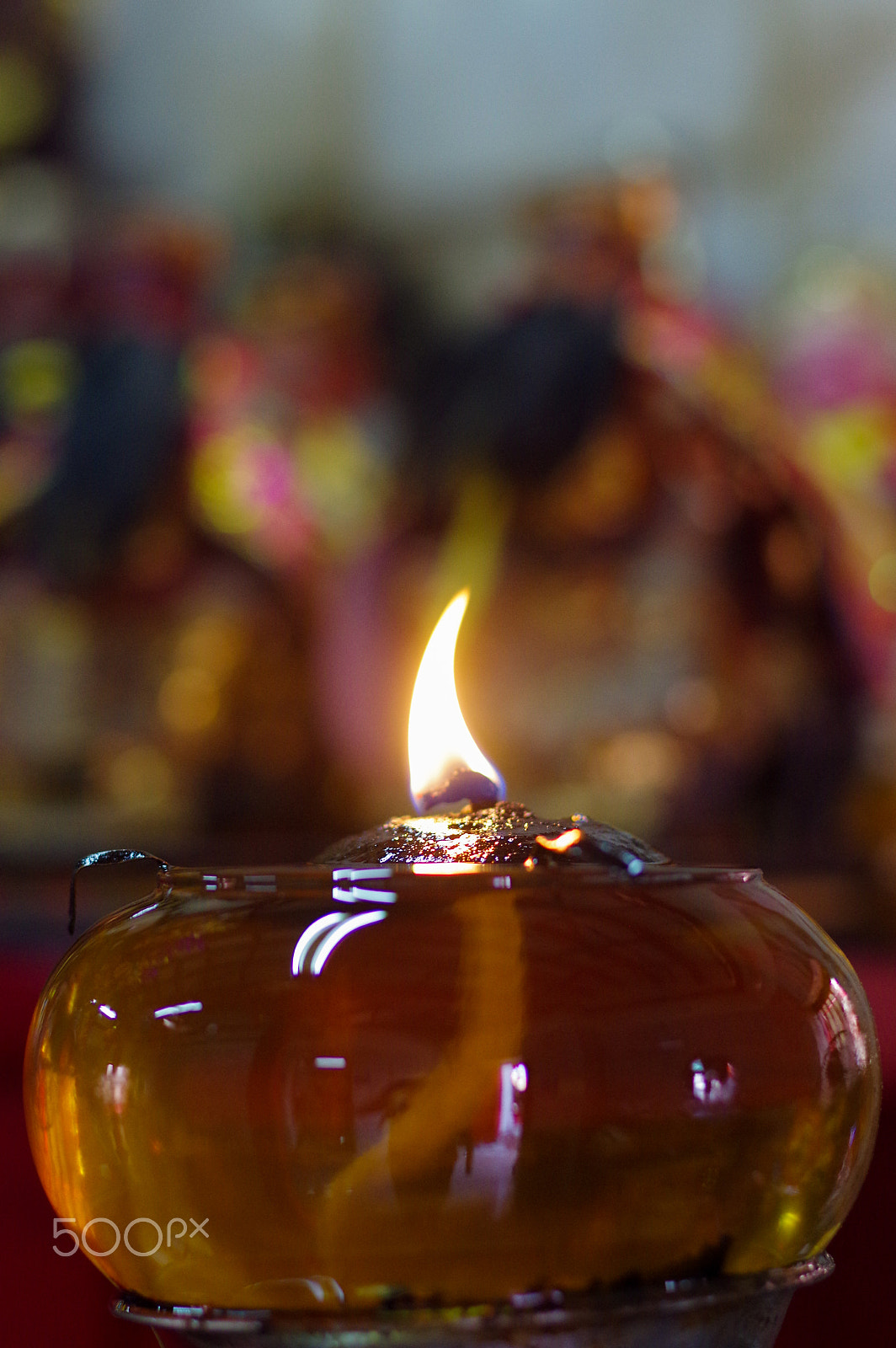 Pentax K-3 + Pentax smc DA* 55mm F1.4 SDM sample photo. Burning oil lamps at religious temple. thailand photography