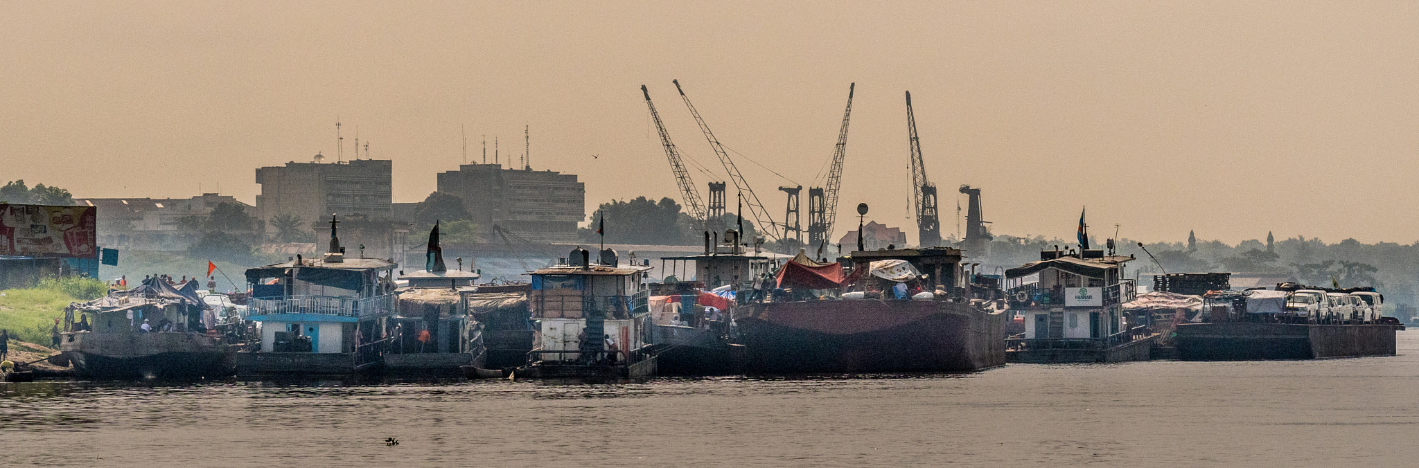 Nikon AF-S Nikkor 70-200mm F4G ED VR sample photo. Cranes and barges, kisangani photography