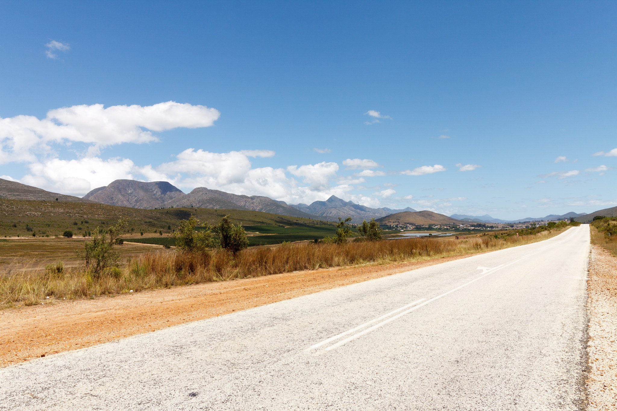 Canon EOS 50D sample photo. Road lines leading to nowhere photography