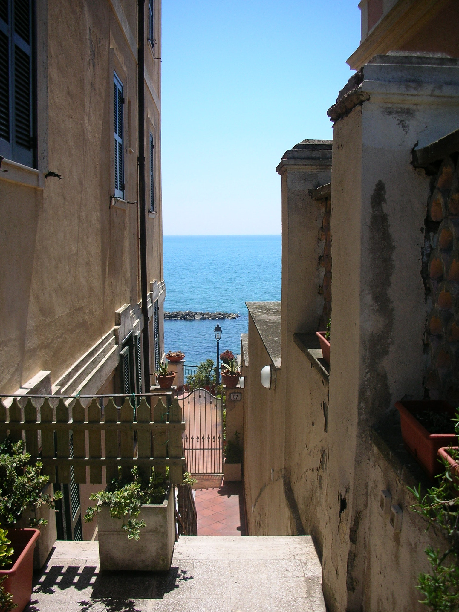 Nikon S1 sample photo. View between houses in anzio photography