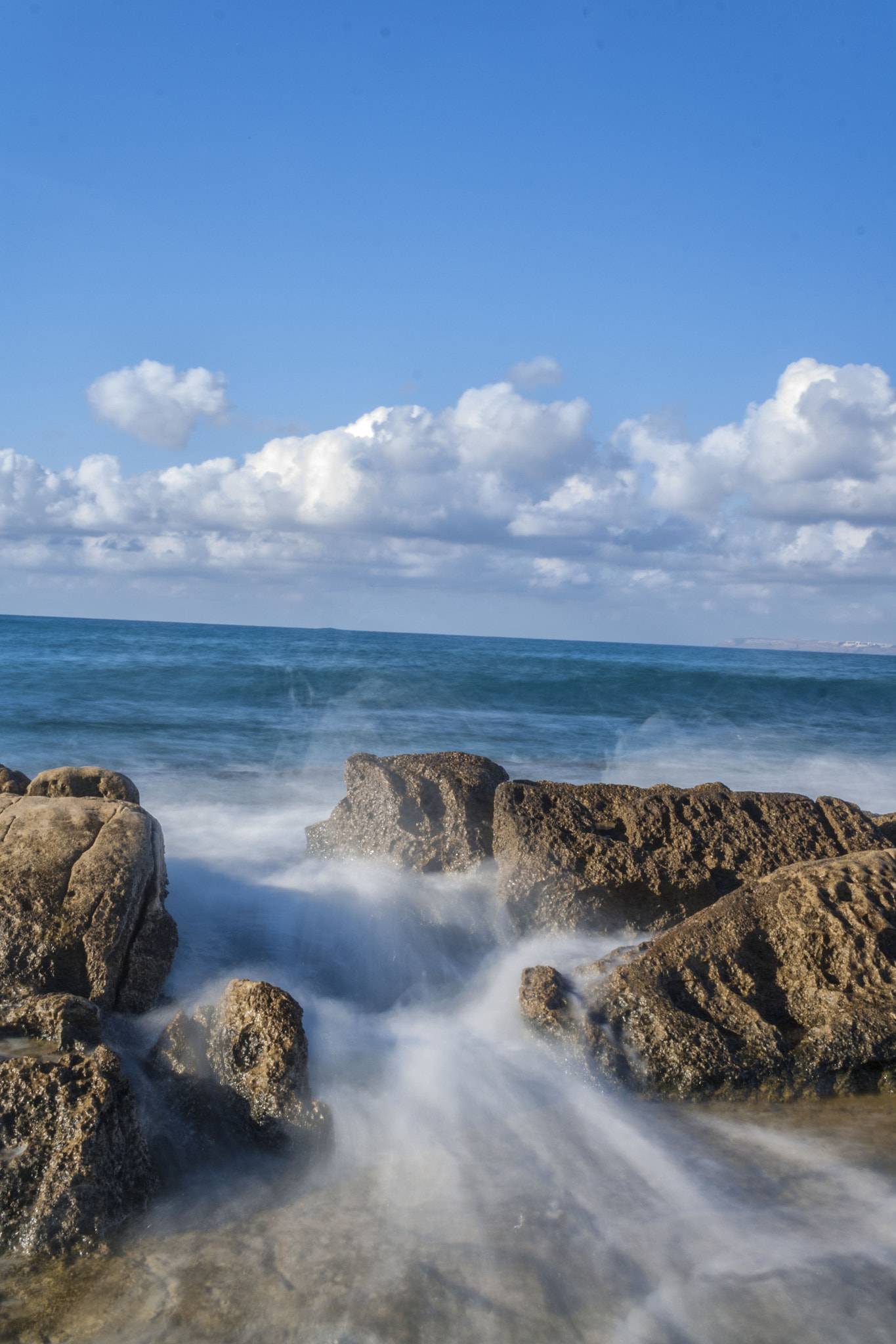 Canon EF-S 24mm F2.8 STM sample photo. Las olas nunca descansan photography