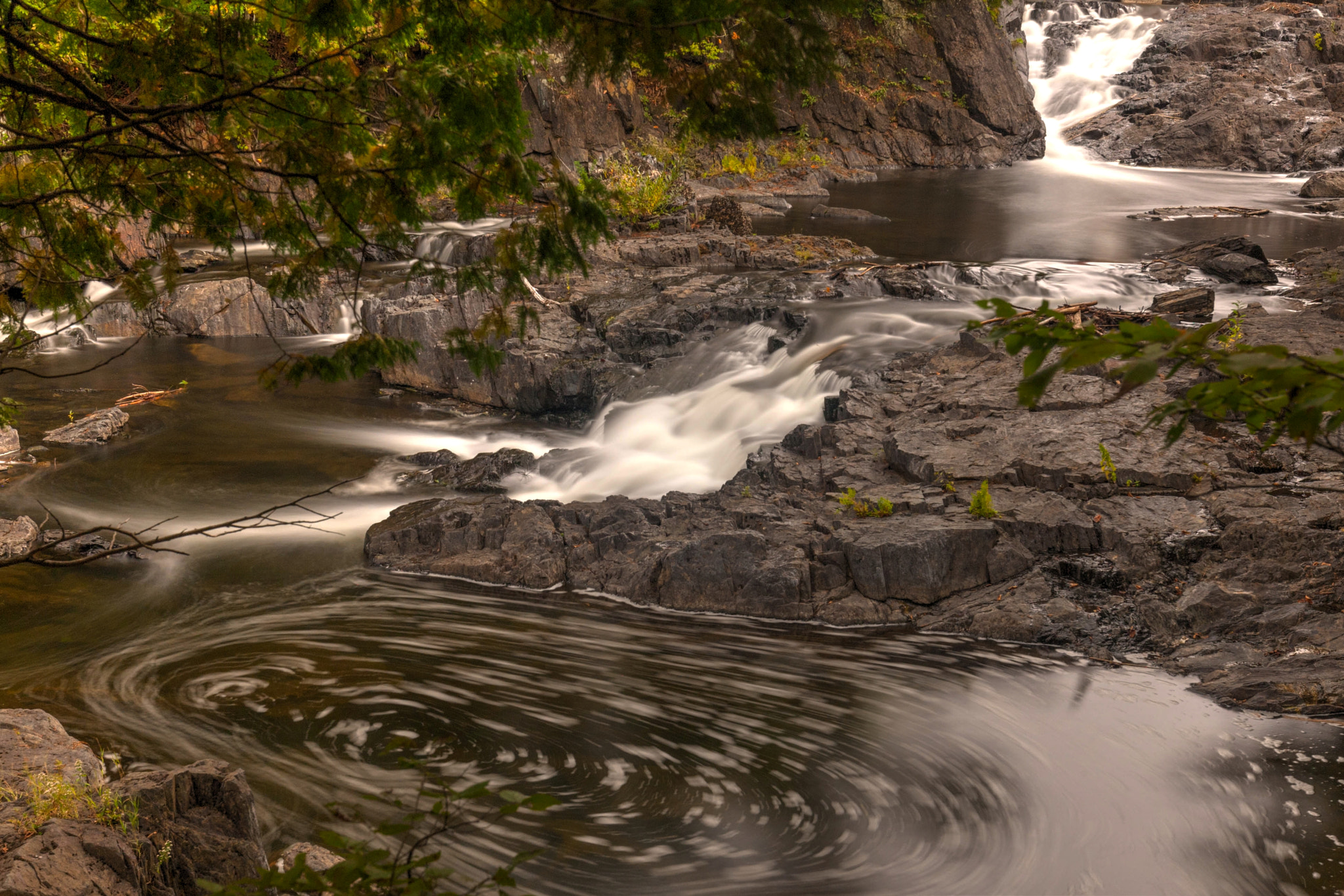 Canon EF 16-35mm F4L IS USM sample photo. Water and rocks photography