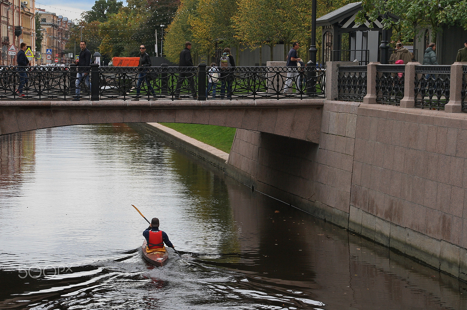 Canon EOS 1000D (EOS Digital Rebel XS / EOS Kiss F) sample photo. In a kayak under a bridge photography