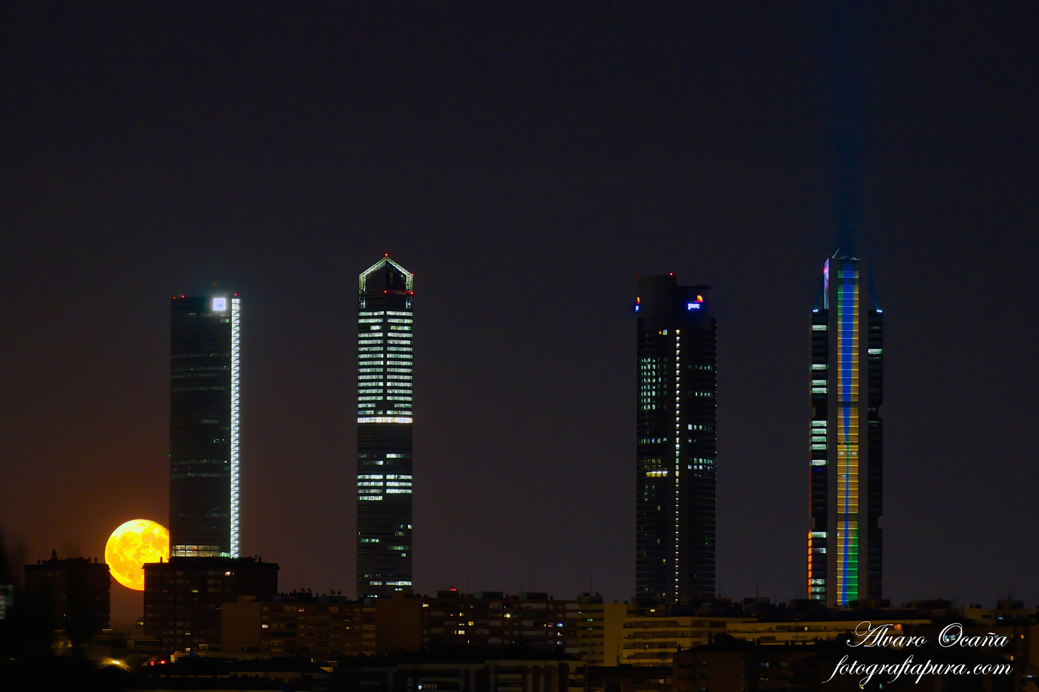Canon EOS 500D (EOS Rebel T1i / EOS Kiss X3) sample photo. Full moon madrid towers (4 torres skyline) photography