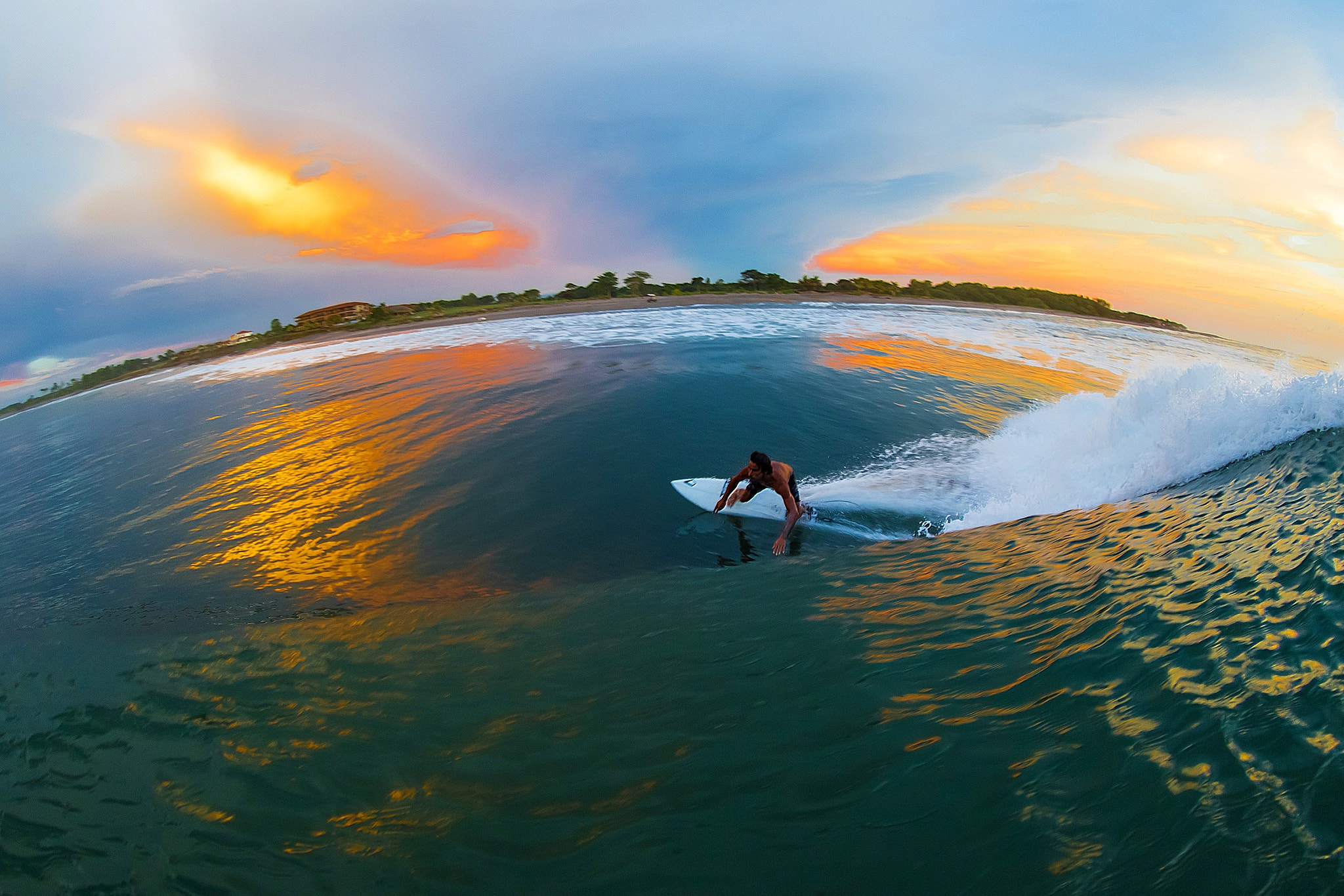 Canon EOS 7D Mark II + Canon EF 8-15mm F4L Fisheye USM sample photo. Surfing at sunset photography