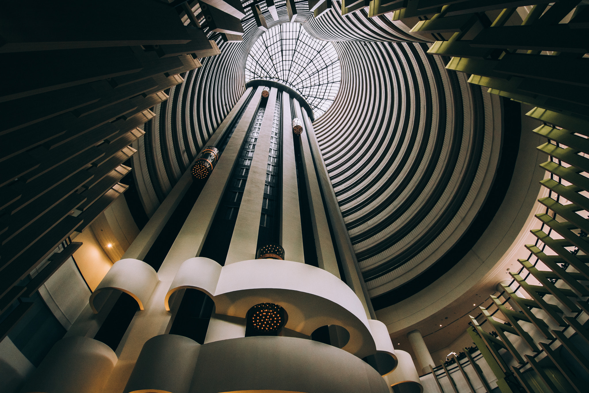 Canon EOS 760D (EOS Rebel T6s / EOS 8000D) sample photo. Holiday inn atrium, singapore - perspective photography