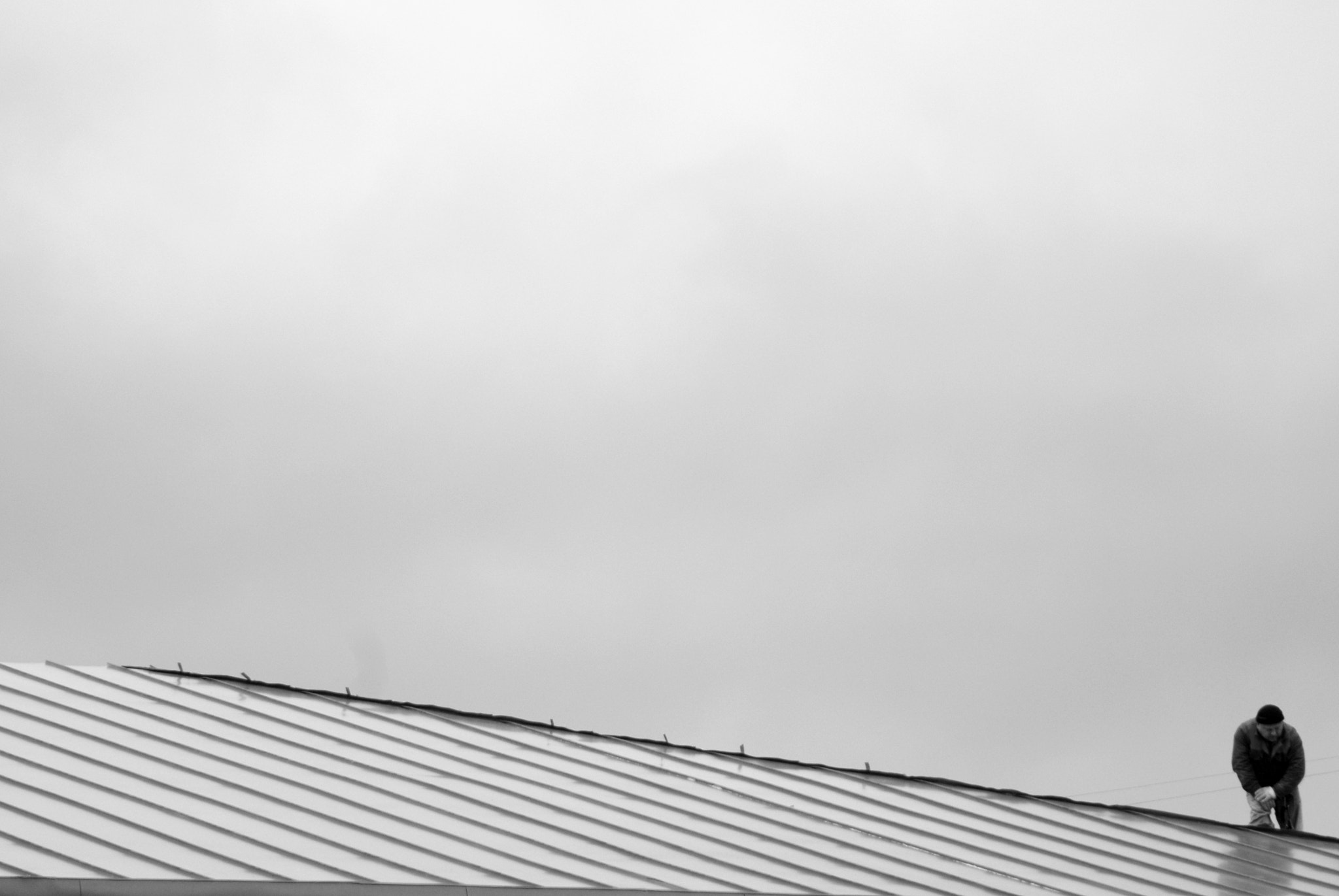 Nikon D200 sample photo. One man on the roof photography