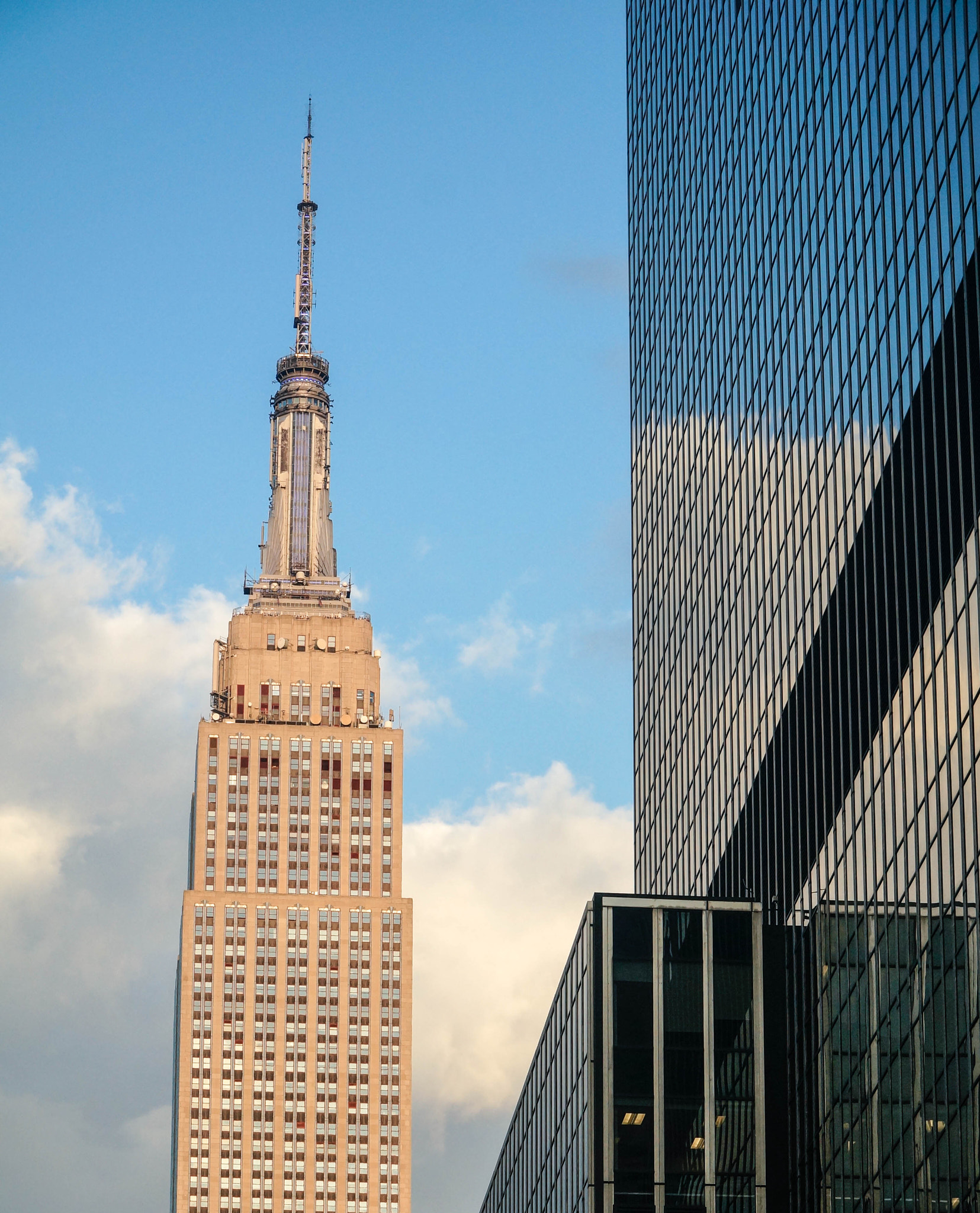 Sony Alpha NEX-6 + Sony E PZ 18-105mm F4 G OSS sample photo. Empire state building in late afternoon photography
