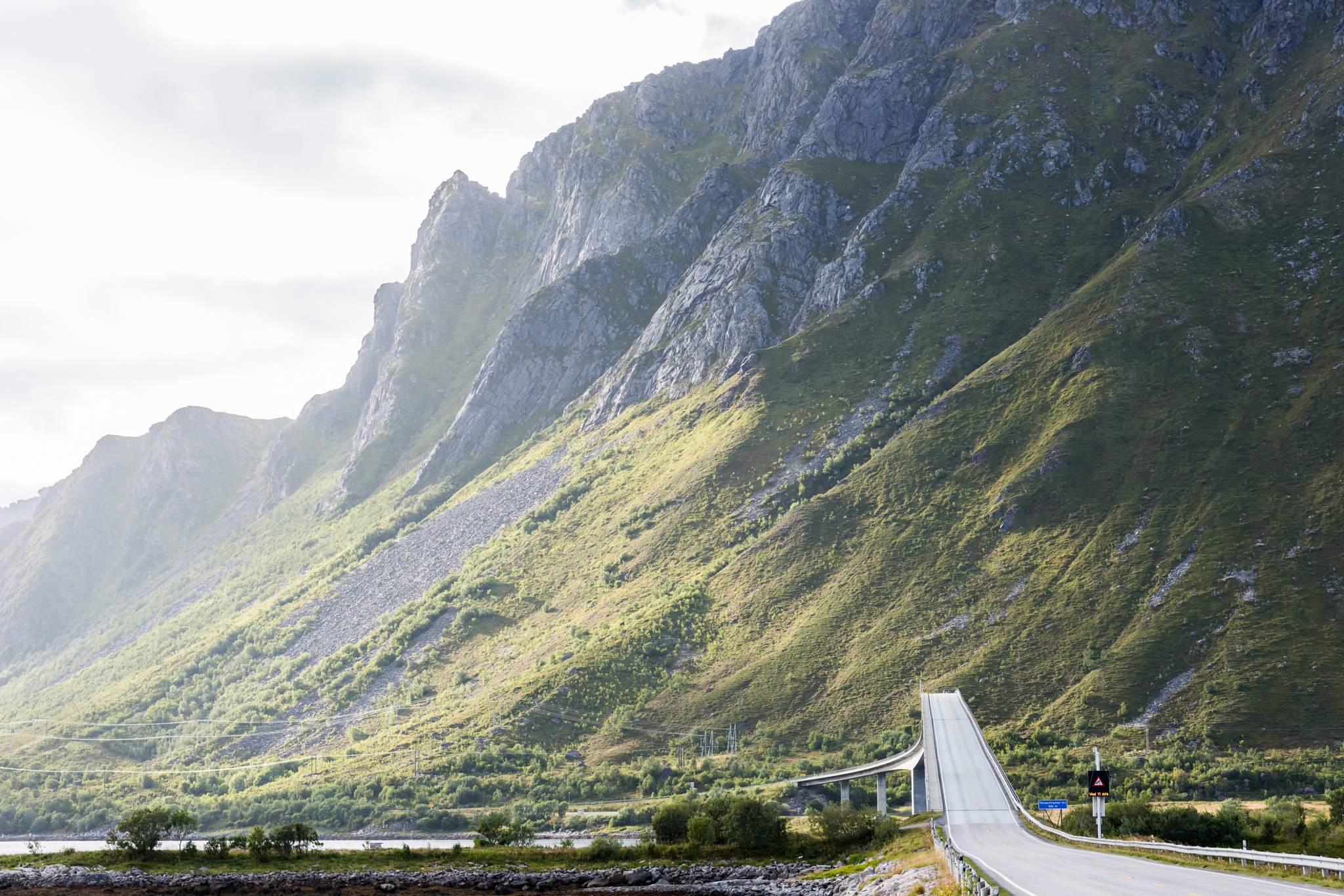 Nikon D810 + Nikon AF Nikkor 85mm F1.8D sample photo. Road in dramatic mountain landscape photography