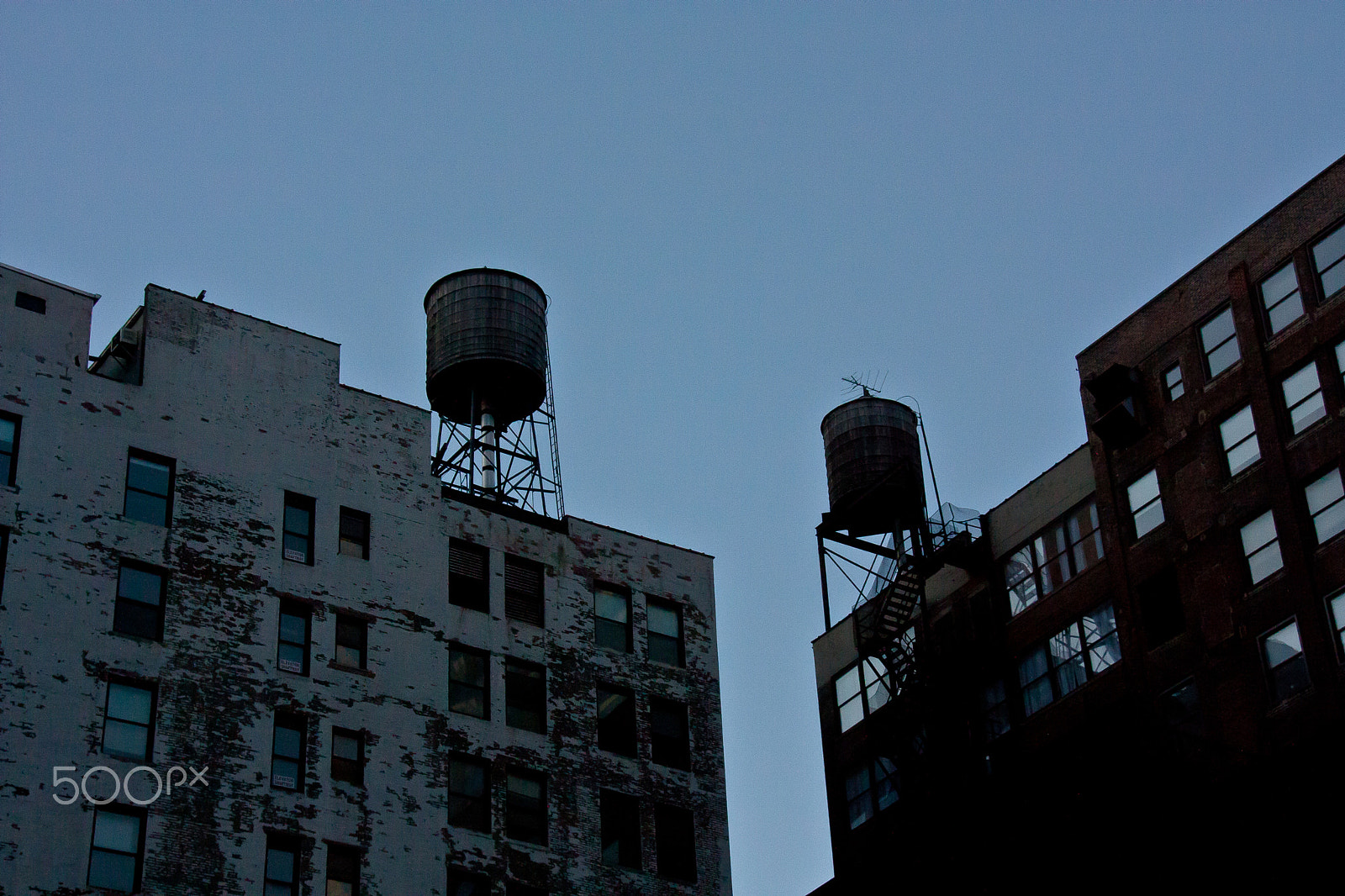 Canon EOS 450D (EOS Rebel XSi / EOS Kiss X2) sample photo. Watertank silhouette photography