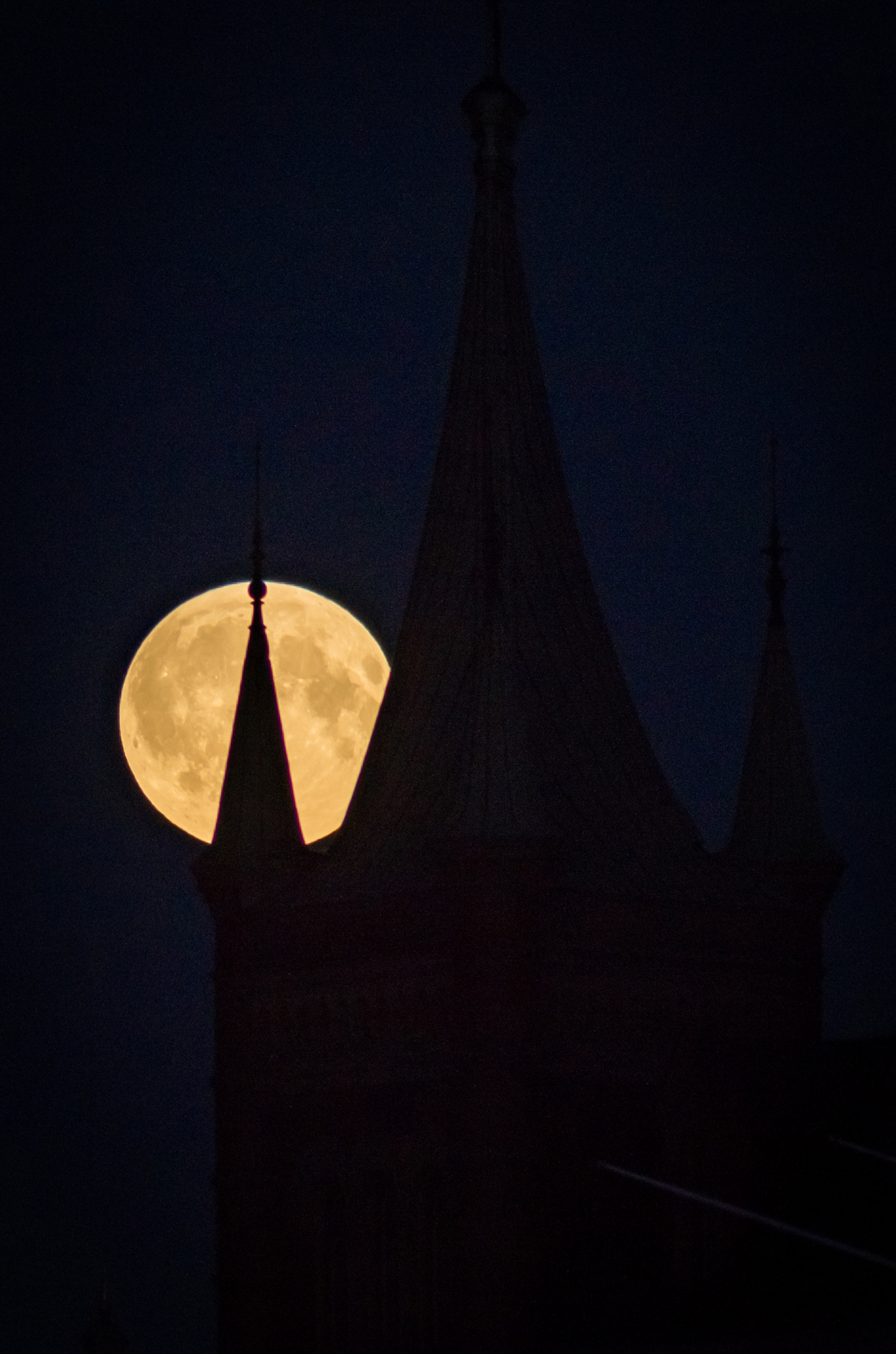 Pentax K-500 + Tamron AF 70-300mm F4-5.6 Di LD Macro sample photo. The moon behind the tower photography