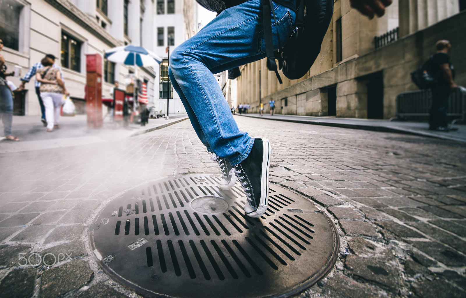 Nikon D610 + Sigma 12-24mm F4.5-5.6 II DG HSM sample photo. Dancer performing tricks on a manhole in manhattan photography