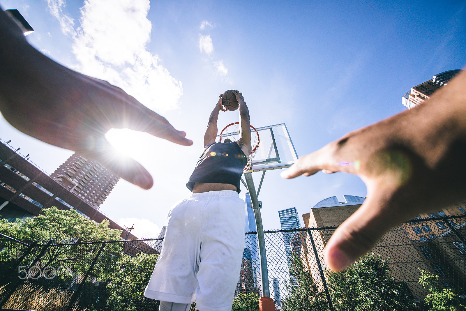 Nikon D610 + Sigma 12-24mm F4.5-5.6 II DG HSM sample photo. Street basketball athlete performing huge slam dunk on the court photography