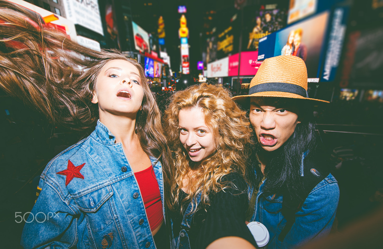 Sigma 12-24mm F4.5-5.6 II DG HSM sample photo. Three friends making party in time square,new york. taking selfi photography