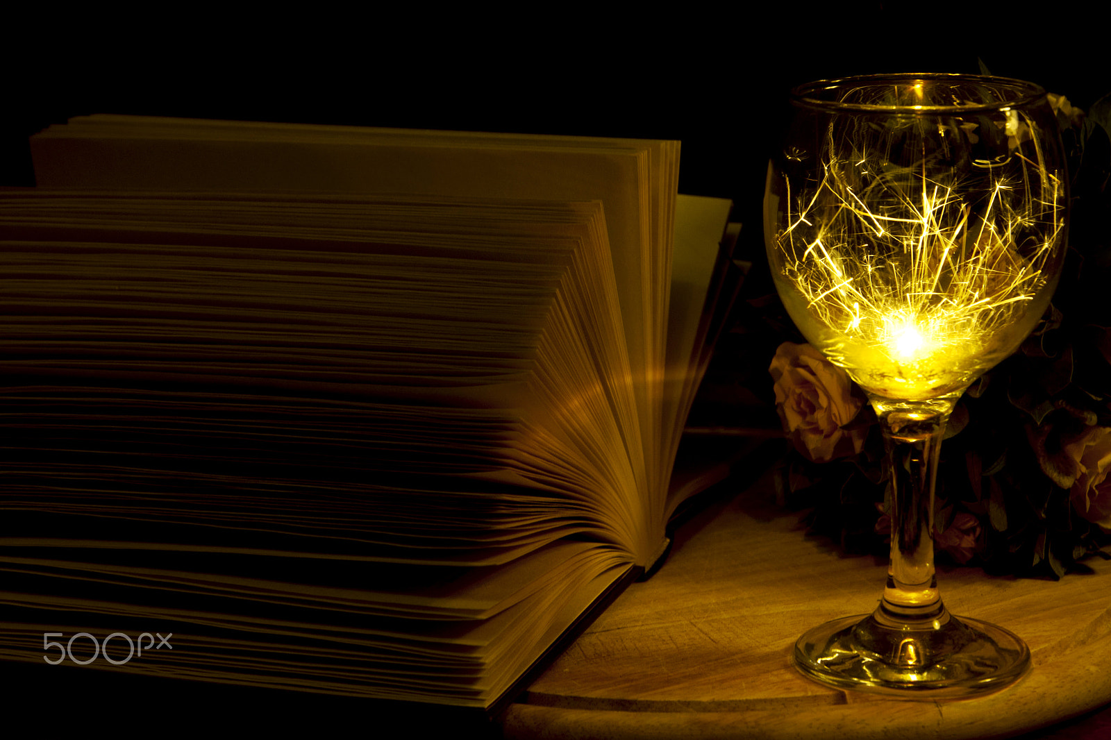 Sony Alpha DSLR-A700 sample photo. Magic literature and sparks in the glass photography