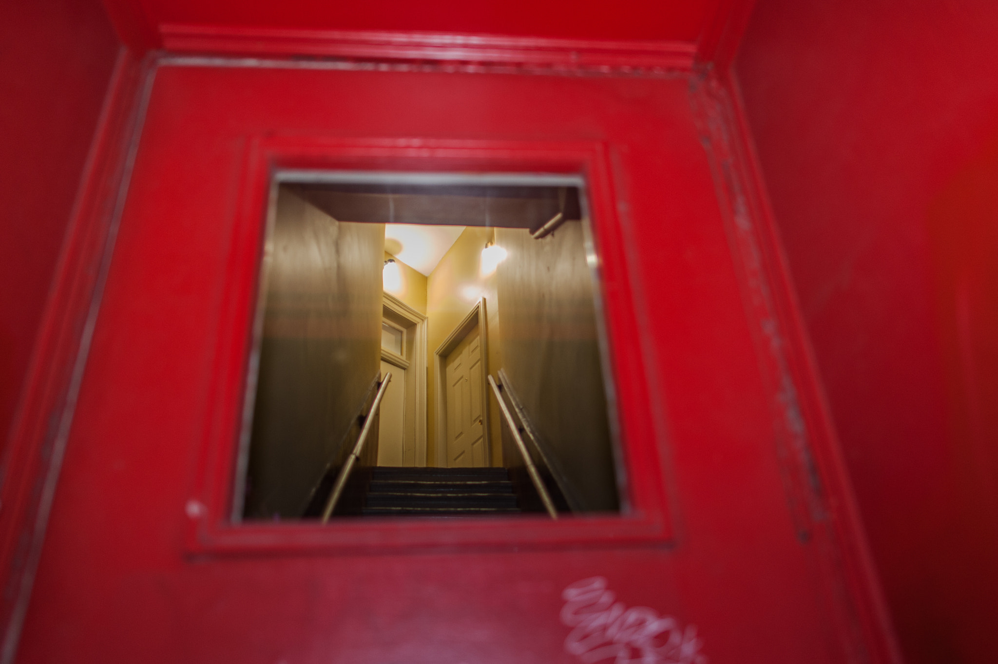 Nikon D700 + Nikon AF-S Nikkor 24mm F1.4G ED sample photo. Behind the red door photography