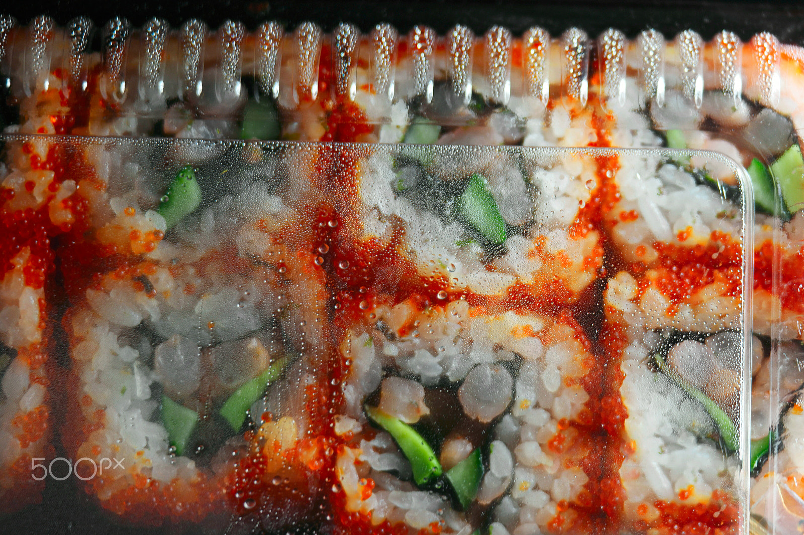 Samsung NX500 + NX 50-200mm F4-5.6 sample photo. Japan sushi in packaging box top view, drops of water on inner side of plastic cover photography
