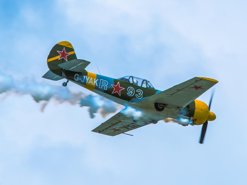 Sigma 150-500mm F5-6.3 DG OS HSM sample photo. Stunt planes 1 photography