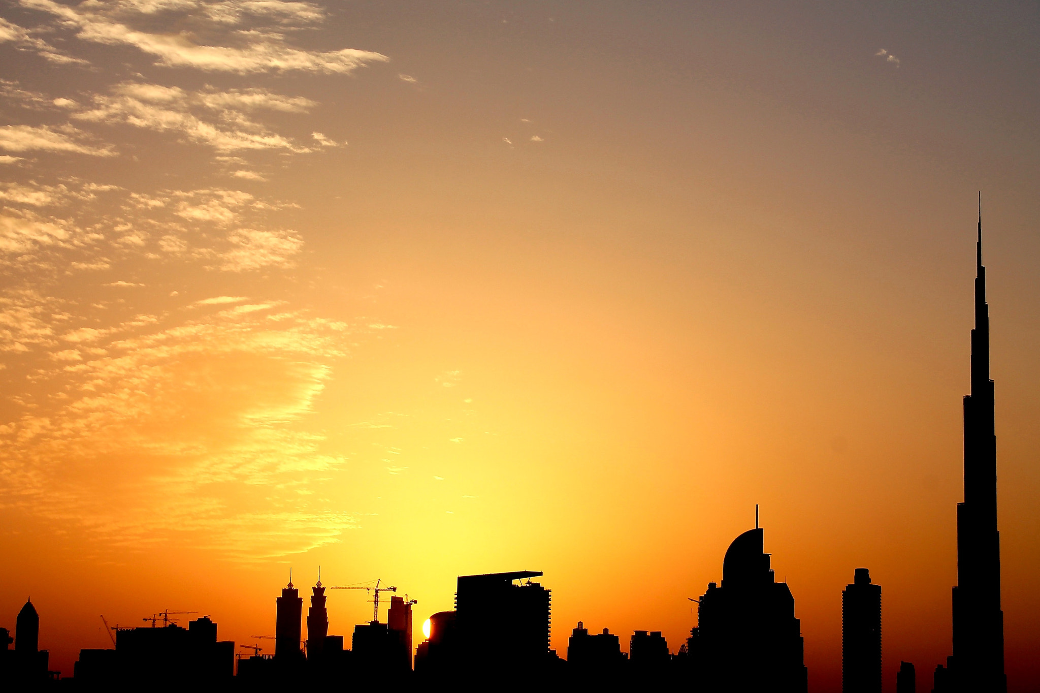 Canon EOS 1100D (EOS Rebel T3 / EOS Kiss X50) + Canon EF-S 18-55mm F3.5-5.6 III sample photo. Golden sunset over downtown dubai and the burj khalifa photography