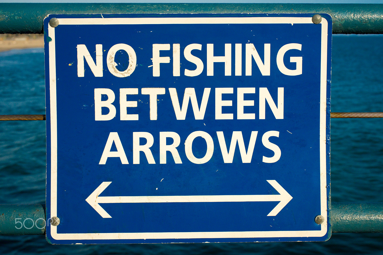 Sony a99 II sample photo. No fishing sign at santa monica pier photography