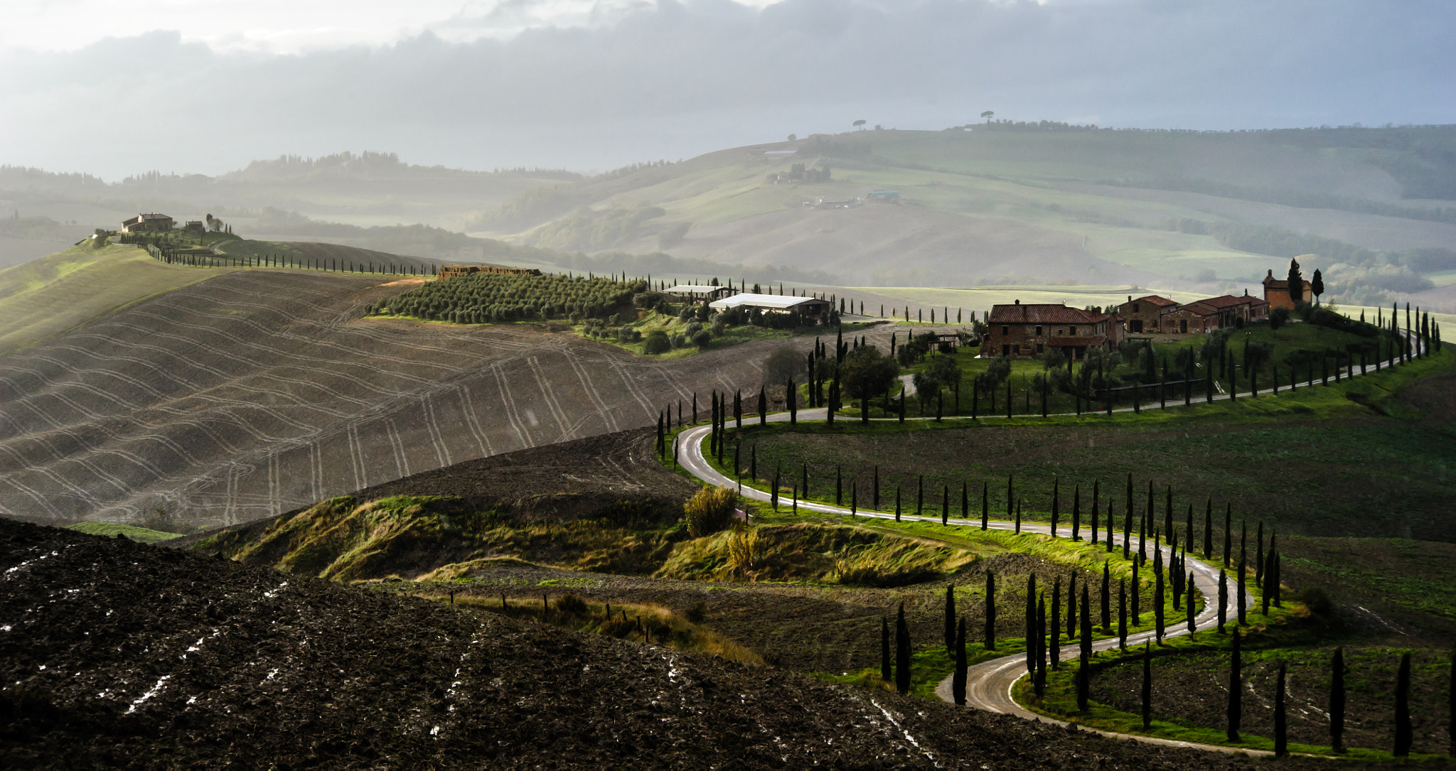 Nikon D700 + AF Nikkor 70-210mm f/4-5.6 sample photo. Rain and sun on tuscany hills photography