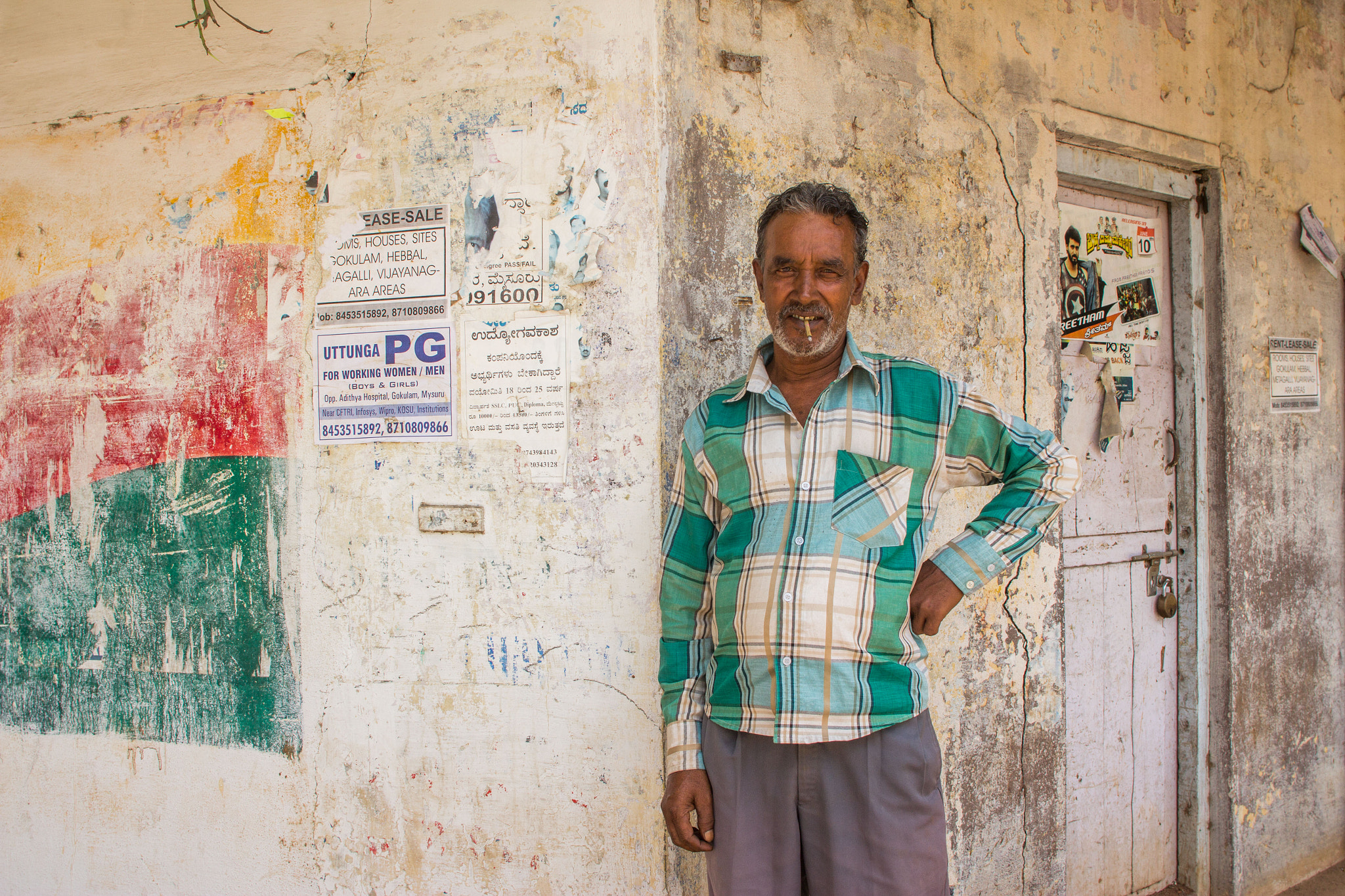 Canon EOS 60D + Canon EF 20mm F2.8 USM sample photo. Man on street during strike in mysore photography