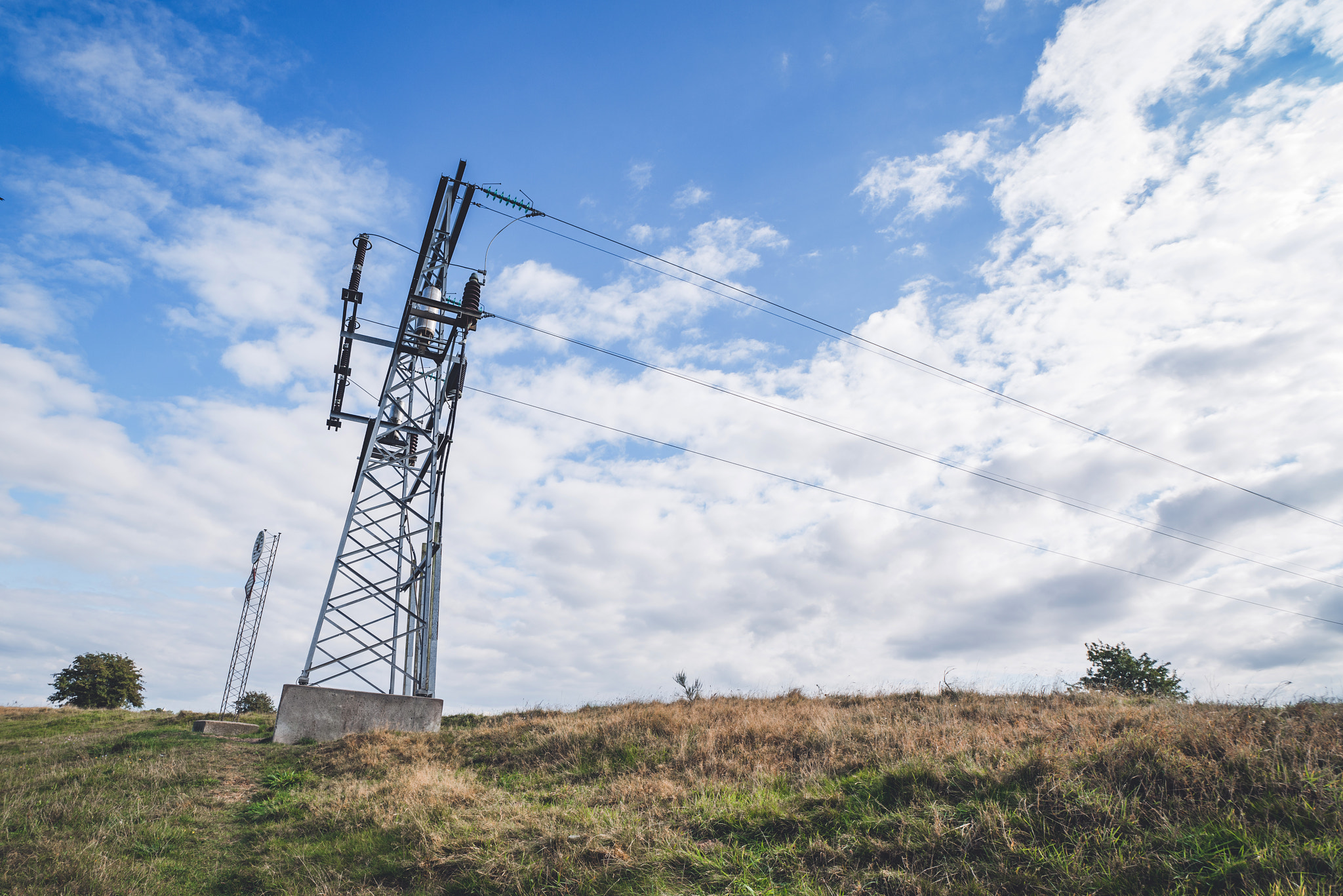 Sony a7R + Sony Vario-Sonnar T* 16-35mm F2.8 ZA SSM sample photo. Large pylons with electrical wires photography