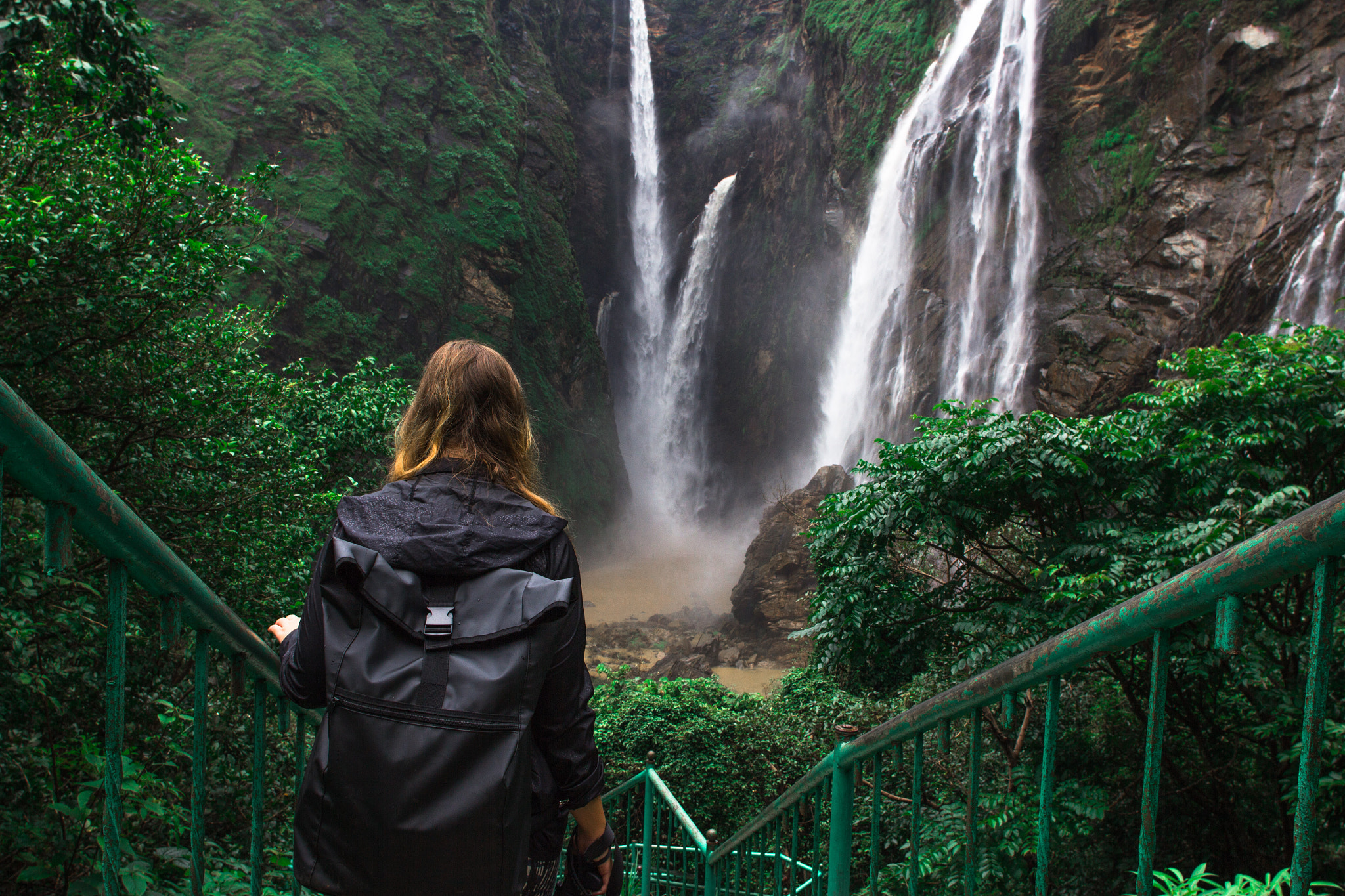 Canon EOS 60D + Canon EF 20mm F2.8 USM sample photo. Girl walking down stairs to jogfalls, karnataka photography