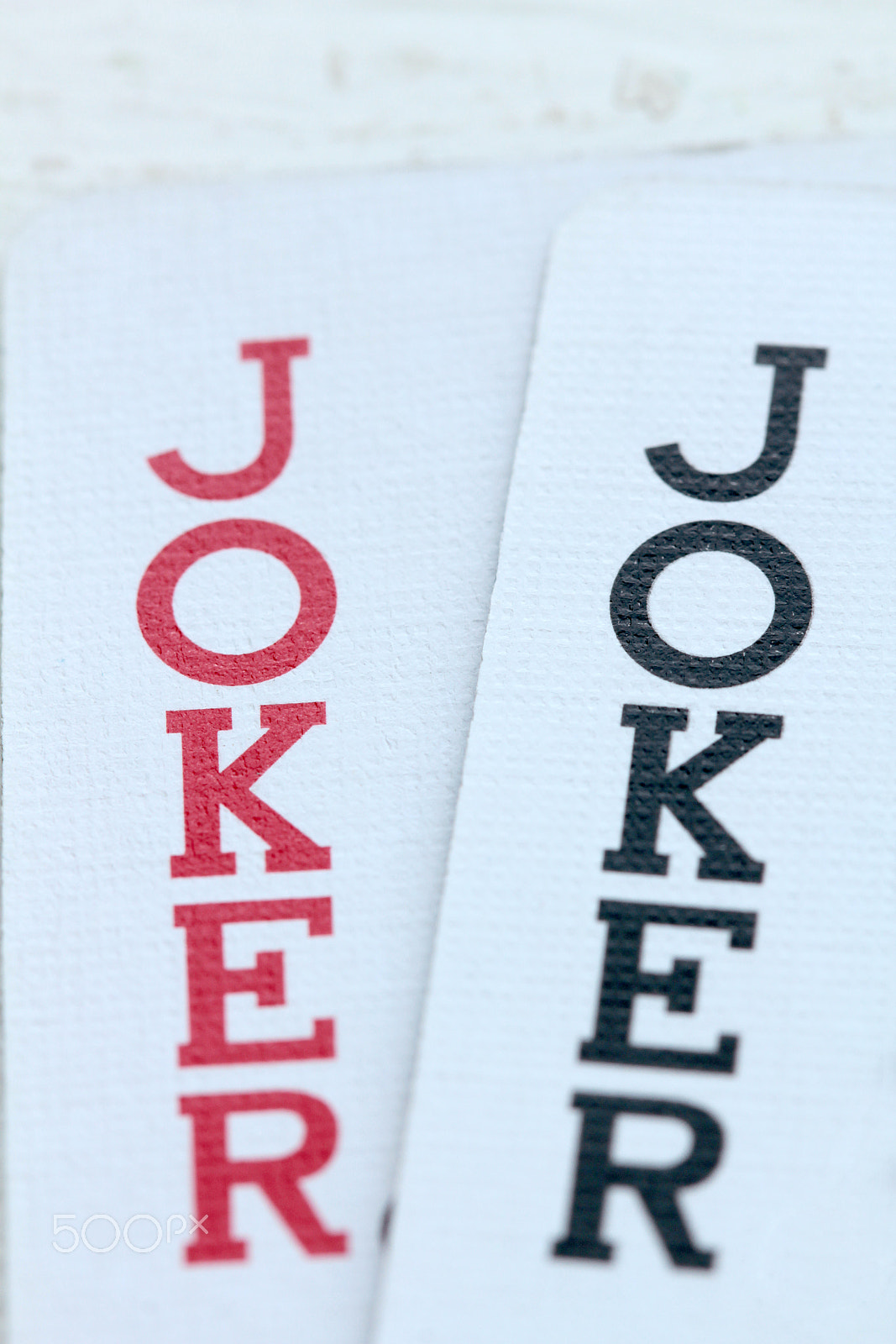 Canon EOS 550D (EOS Rebel T2i / EOS Kiss X4) + Canon EF 100mm F2.8L Macro IS USM sample photo. Playing cards with jokers photography