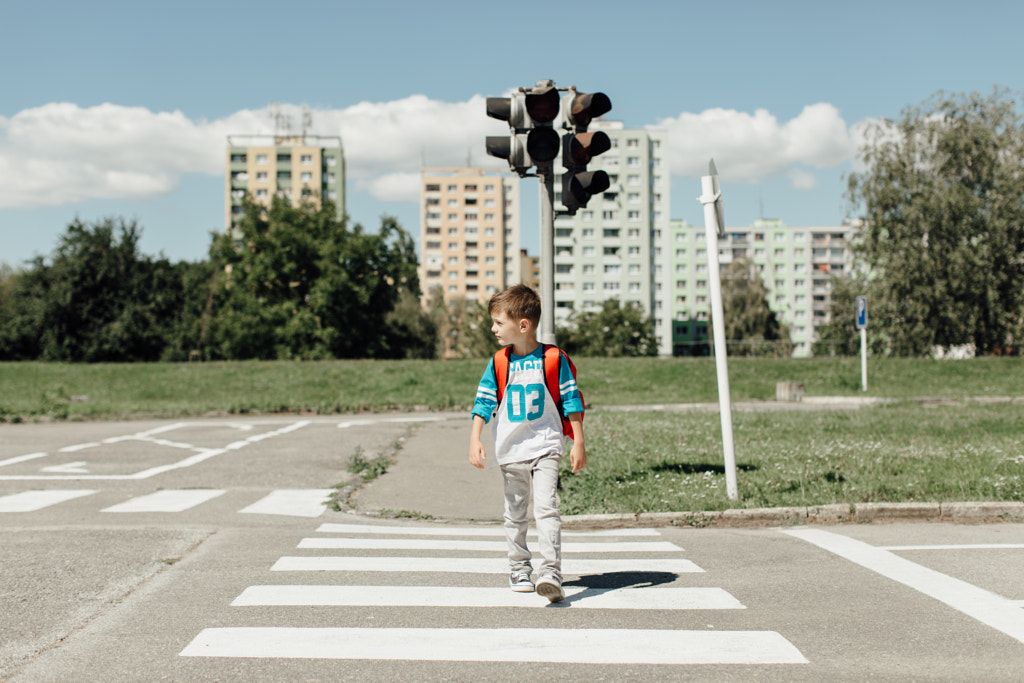 Schoolboy crossing road on way to school by Newman Studio on 500px.com