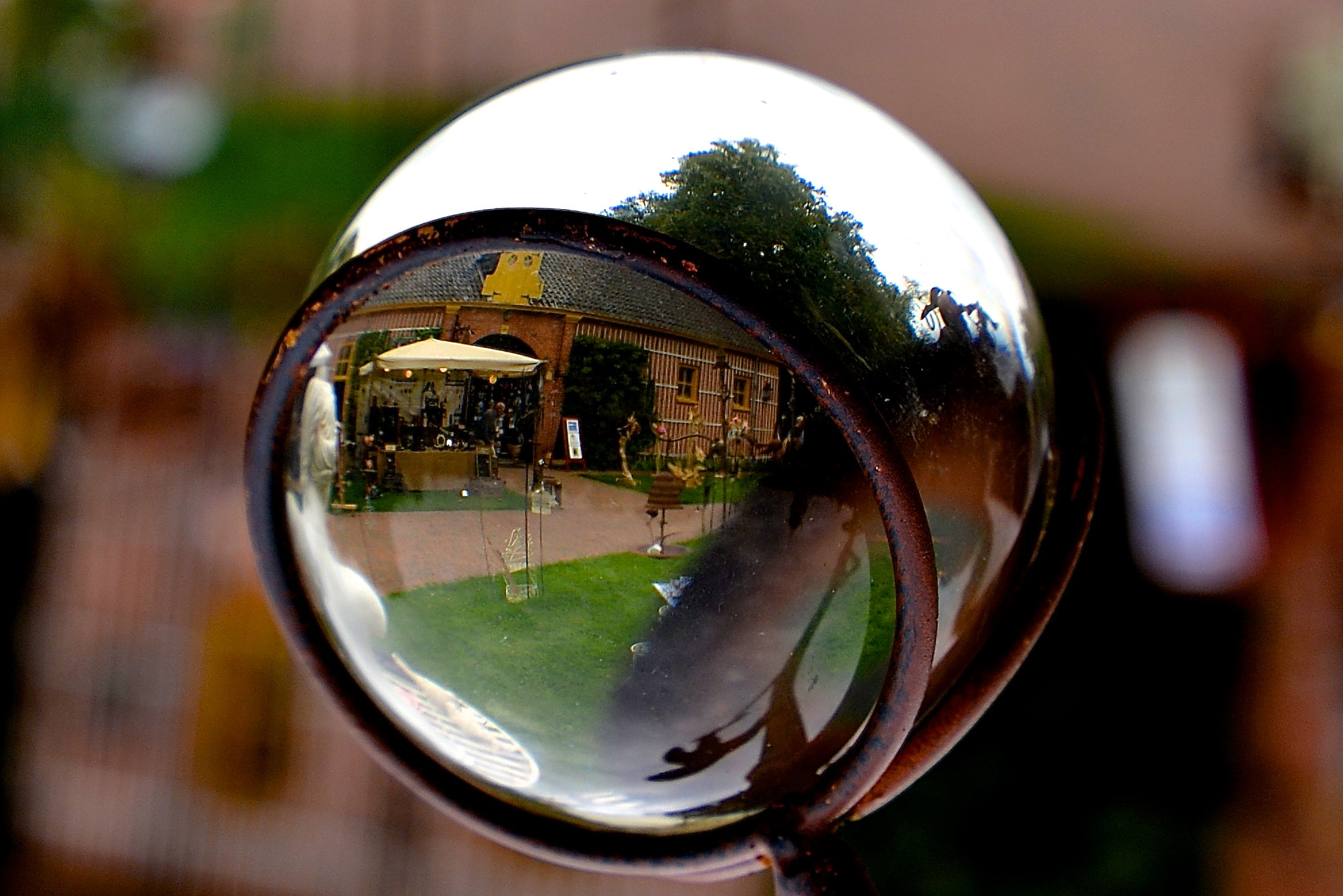 Tokina AT-X 16-28mm F2.8 Pro FX sample photo. Reflection in a glass sphere photography