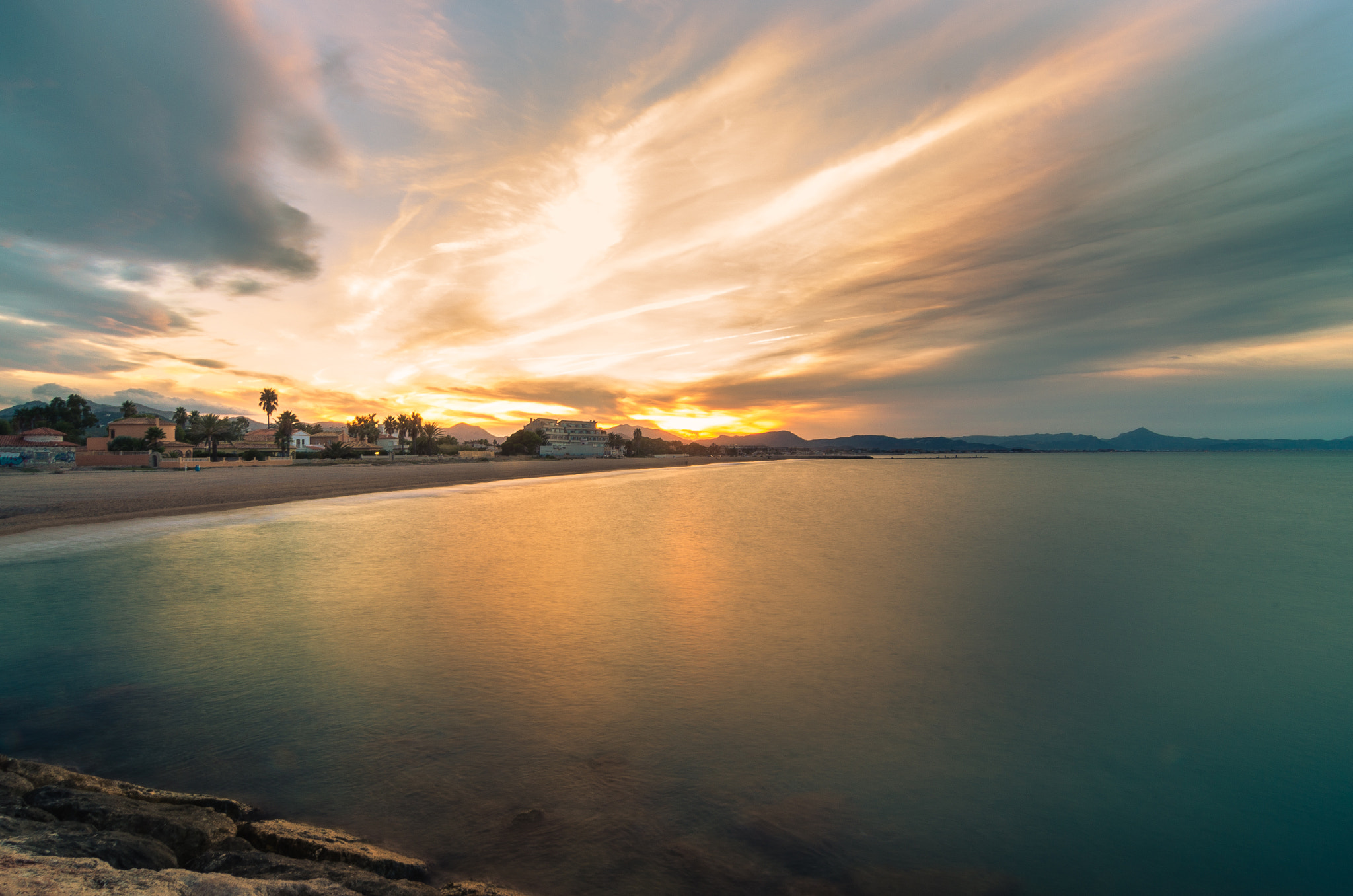 Pentax K-5 IIs sample photo. Posta de sol a la platja de l'almadrava photography