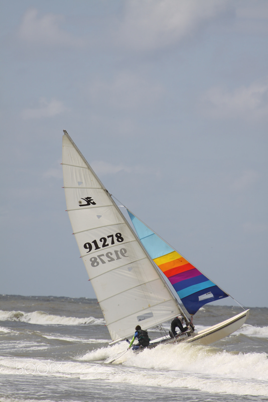 Canon EF 70-200mm F4L USM sample photo. Catamaran sailing over the waves photography