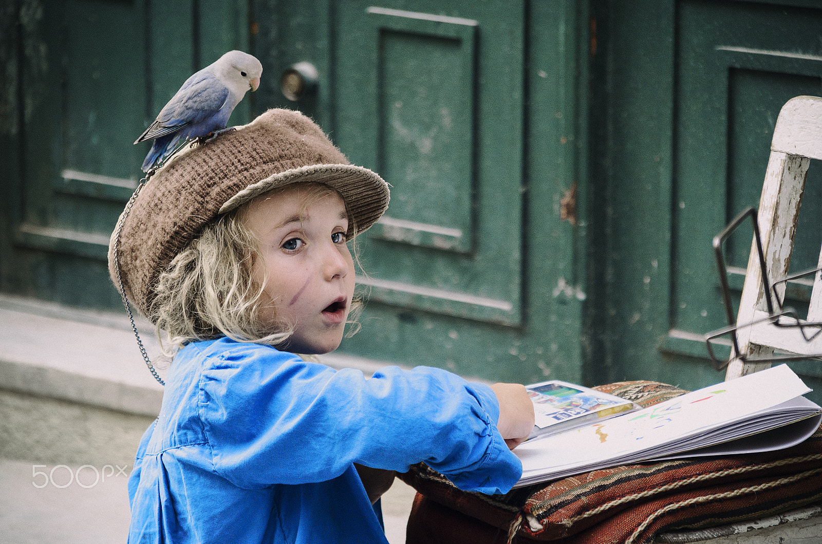 Sigma 18-200mm F3.5-6.3 DC OS HSM sample photo. The girl and blue bird photography
