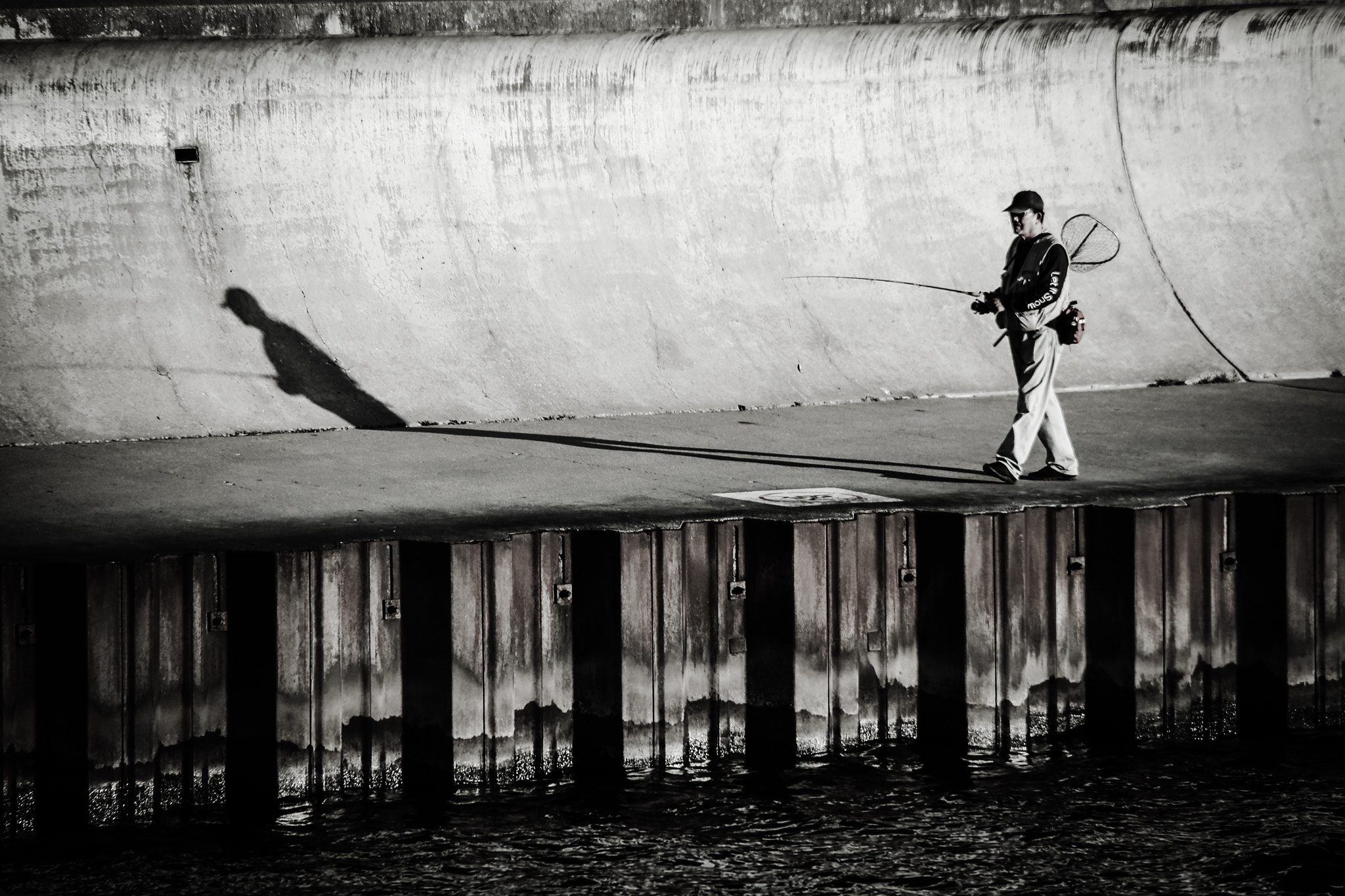 Canon 28-300mm sample photo. Urban fisherman photography