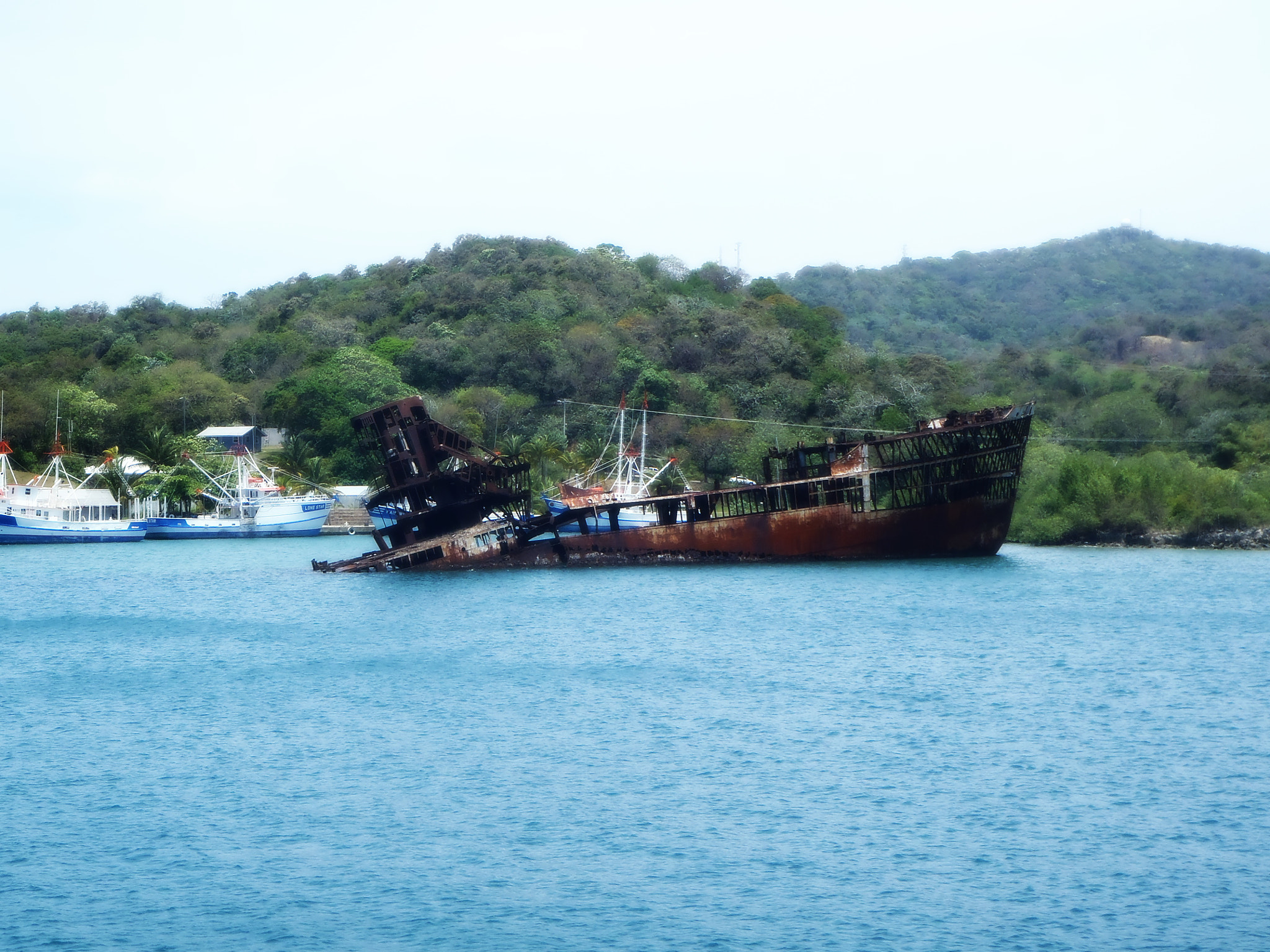 Olympus TG-310 sample photo. Rusty boat photography