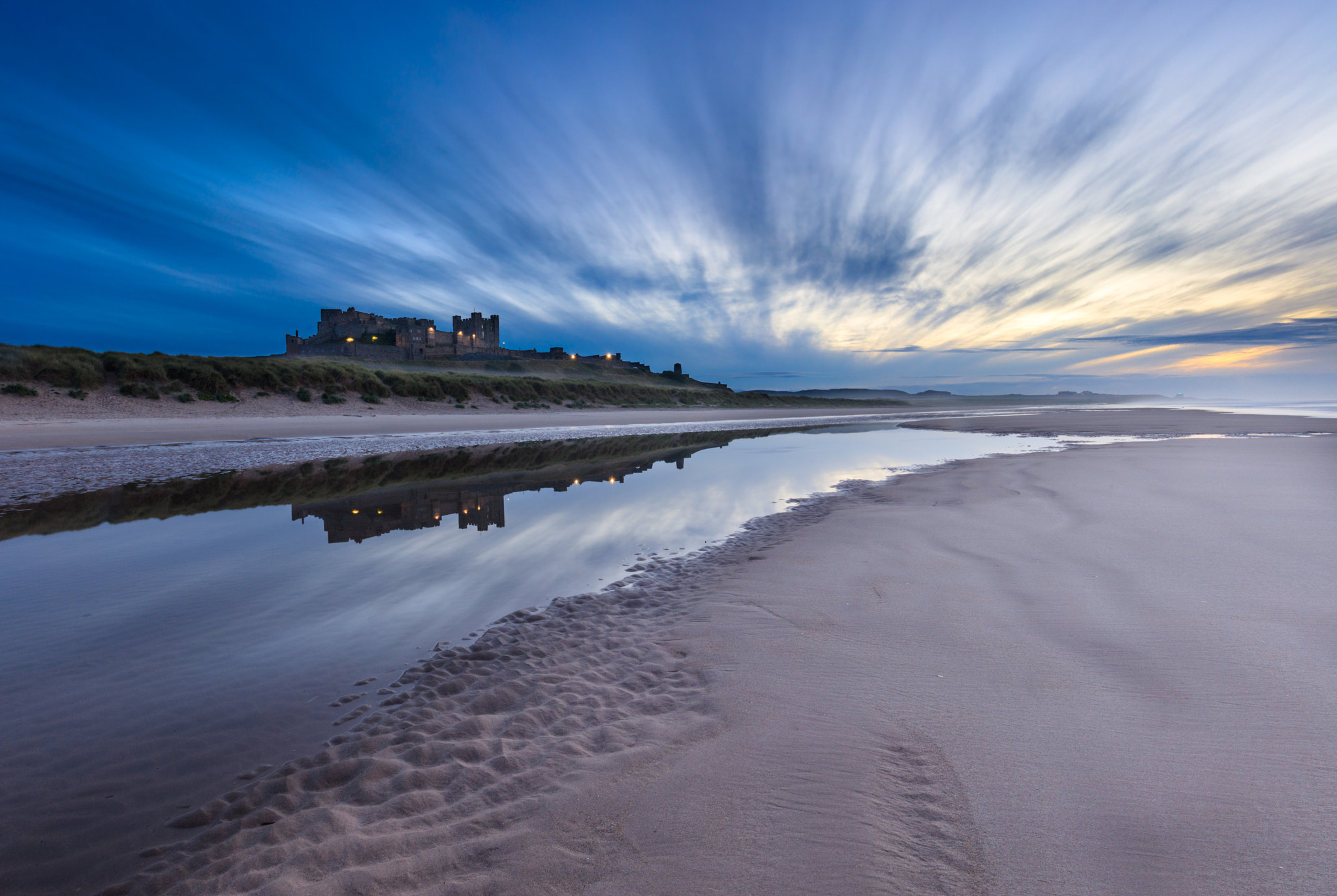 Canon EF 16-35mm F4L IS USM sample photo. Bamburgh reflection photography