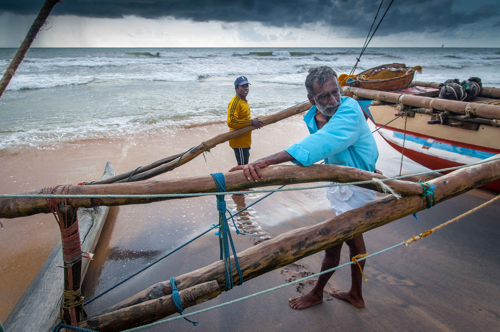 Nikon D5000 sample photo. Tired of draging the boat upon the beach, negombo sri lanka photography