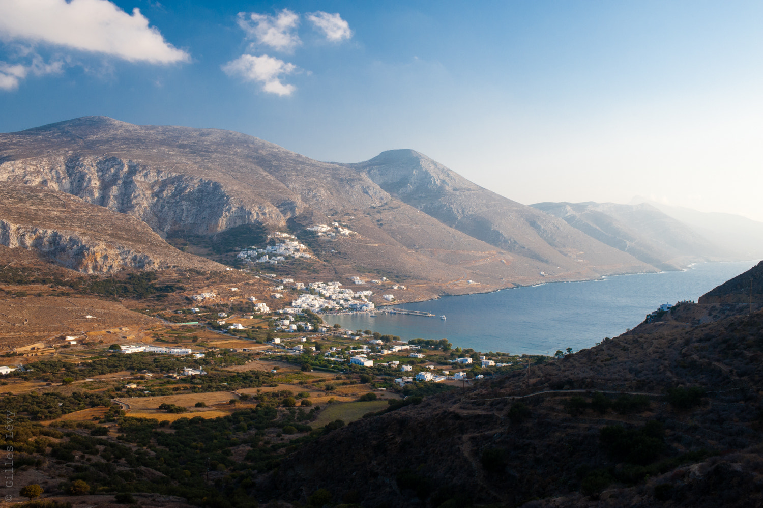 Nikon D700 + Nikon AF-S Nikkor 35mm F1.8G ED sample photo. The aegiali bay seen from tholaria photography