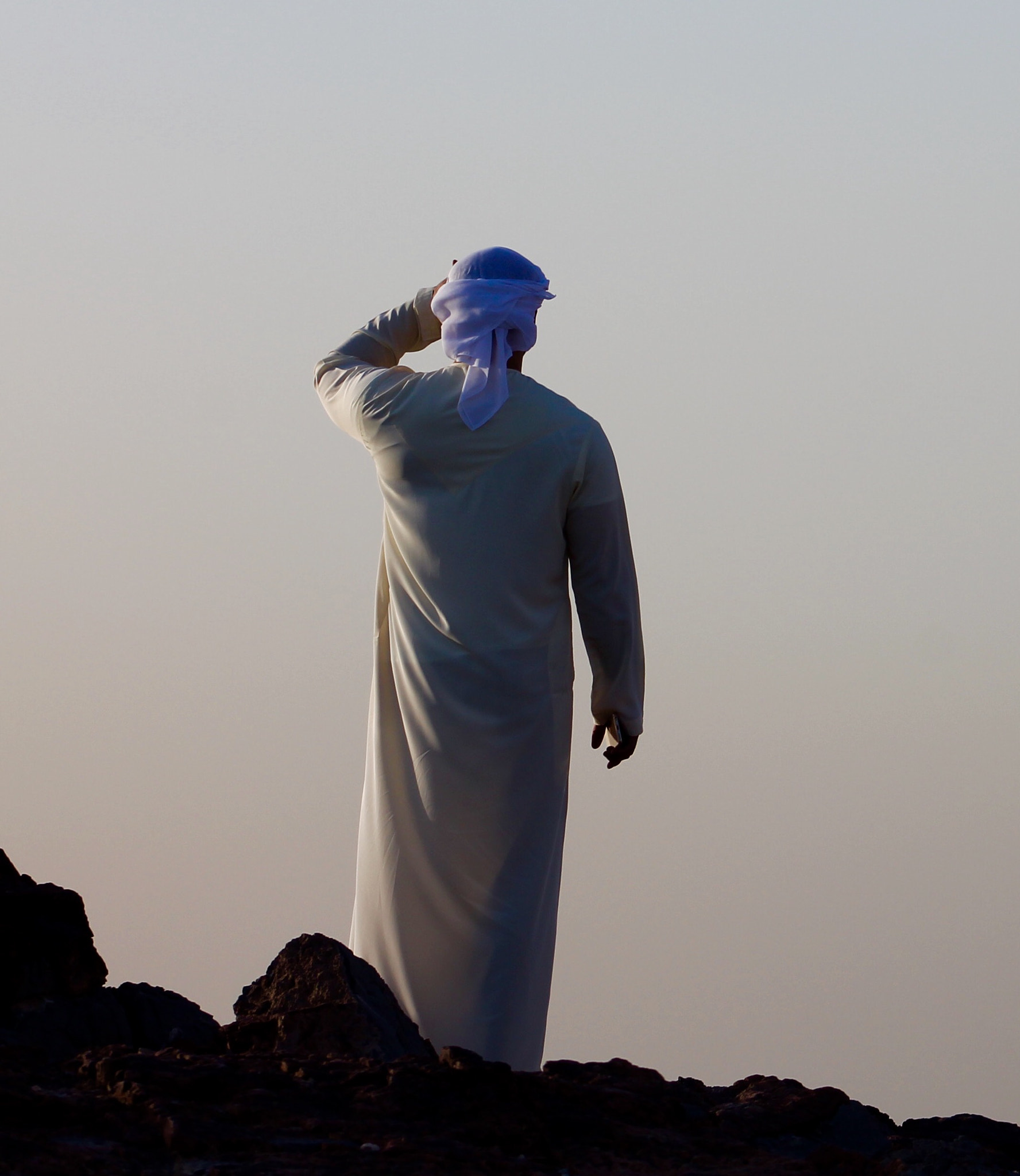 Canon EF75-300mm f/4-5.6 sample photo. Local emirati looks down on to ras al khaimah thro ... photography