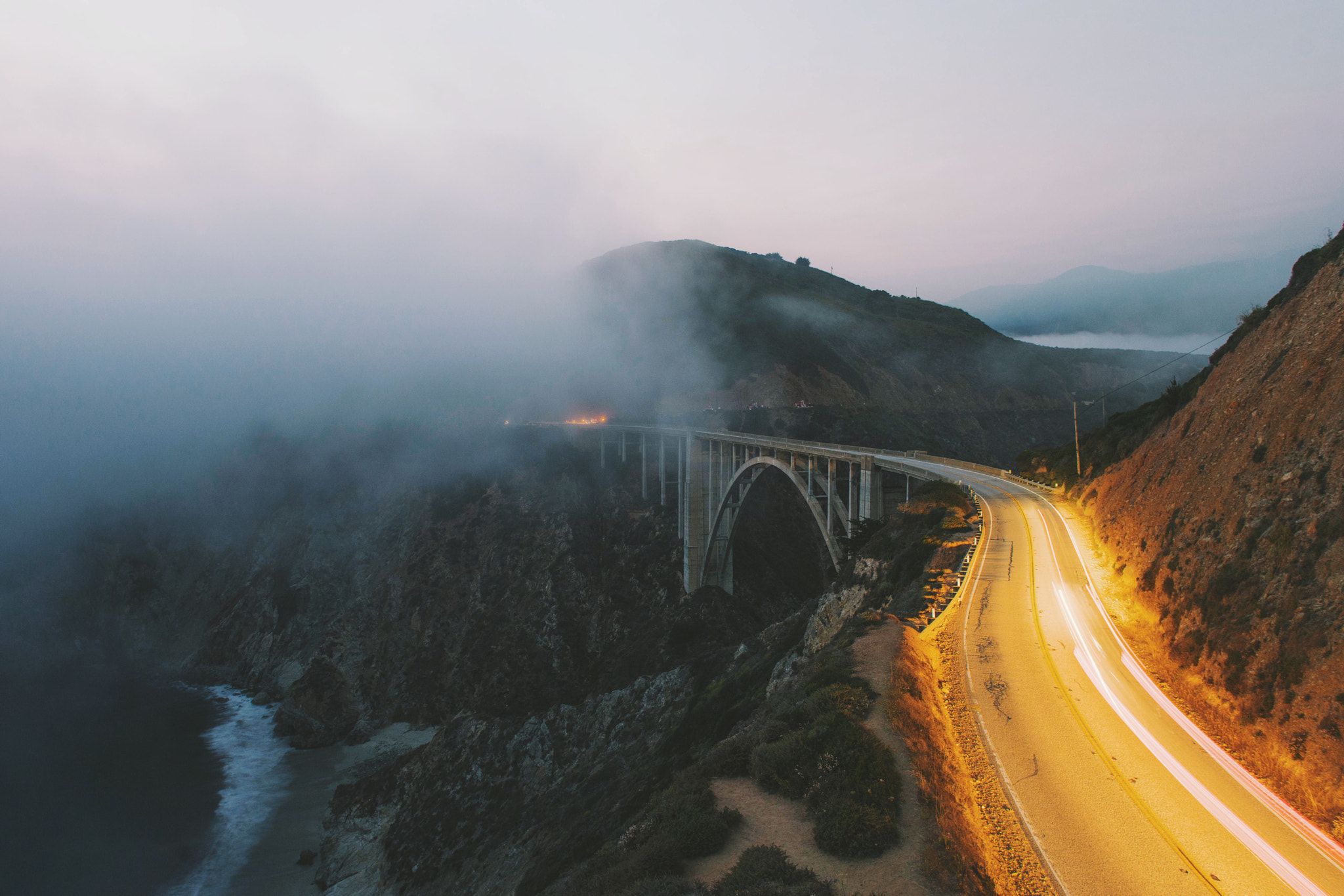 Sigma 24mm F1.8 EX DG Aspherical Macro sample photo. Bixby bridge amongst the smoke photography