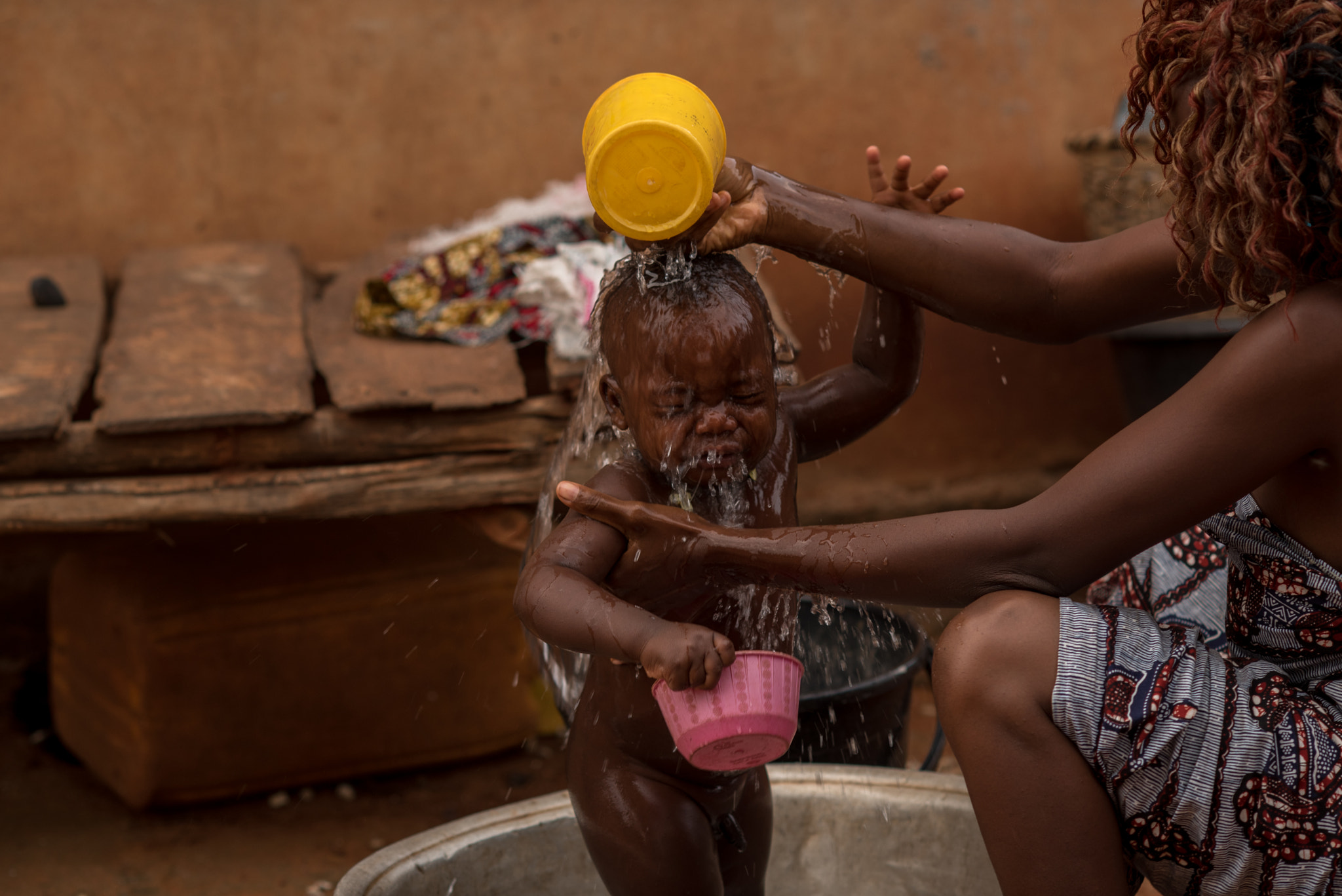 Nikon D750 + AF DC-Nikkor 135mm f/2D sample photo. Morning bath - abomey, benin photography