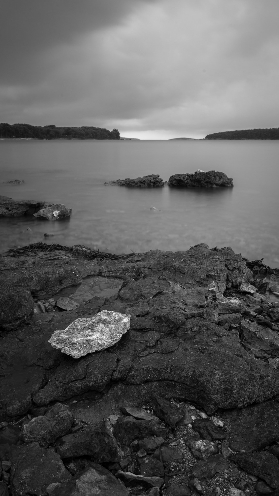 Tamron 18-270mm F3.5-6.3 Di II PZD sample photo. White stone and a cloudy day photography