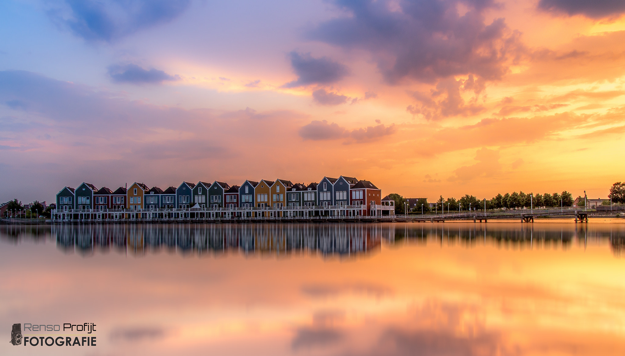 Sigma 17-70mm F2.8-4 DC Macro OS HSM sample photo. Sunset at the rainbow houses photography
