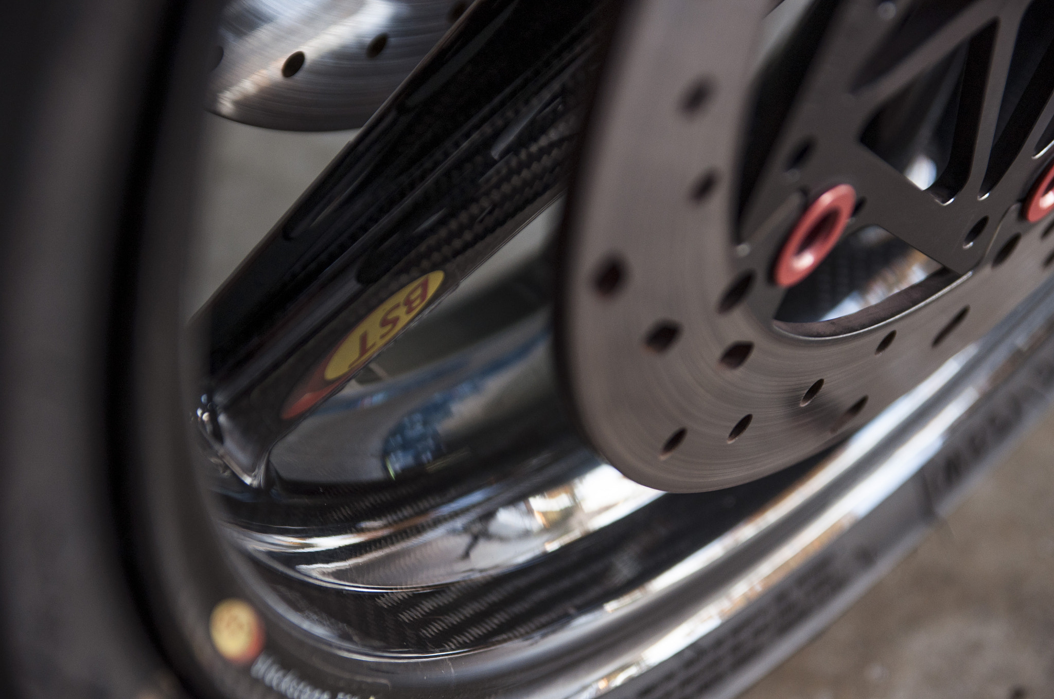 Nikon D90 sample photo. Ducati 998 bst carbon fiber rim with floating rotor photography