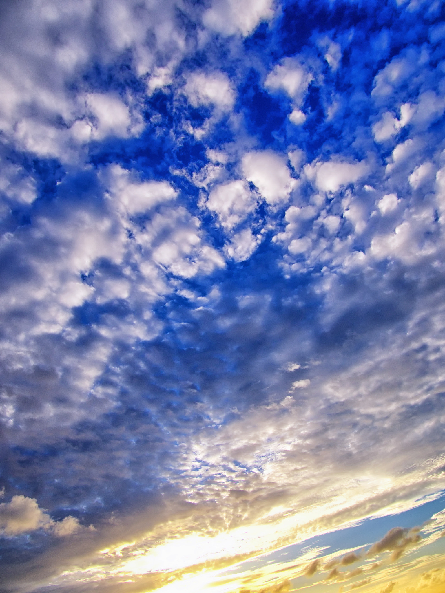 Olympus OM-D E-M1 sample photo. Sunset and clouds. photography
