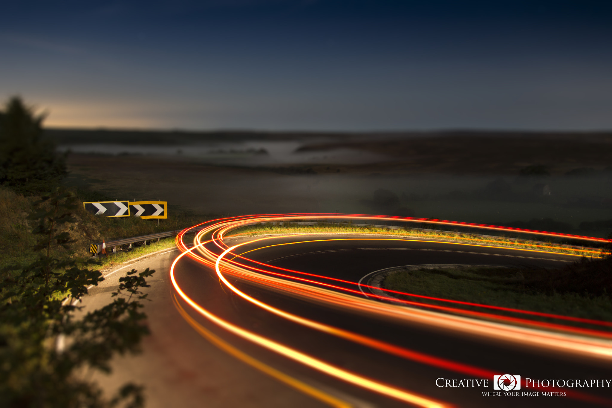 Canon EF-S 17-55mm F2.8 IS USM sample photo. Light trails tilt shift photography