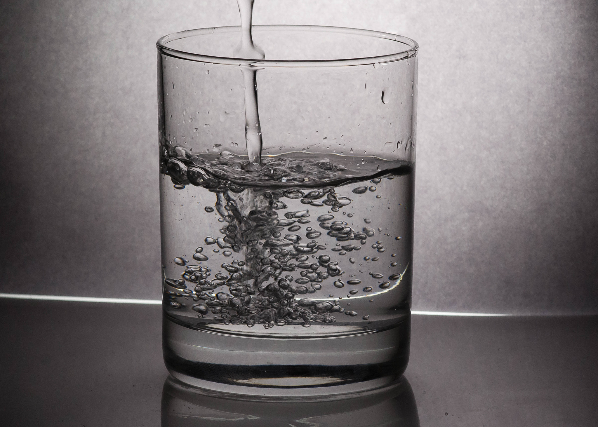 Nikon AF-S DX Micro-Nikkor 85mm F3.5G ED VR sample photo. Water pouring photography